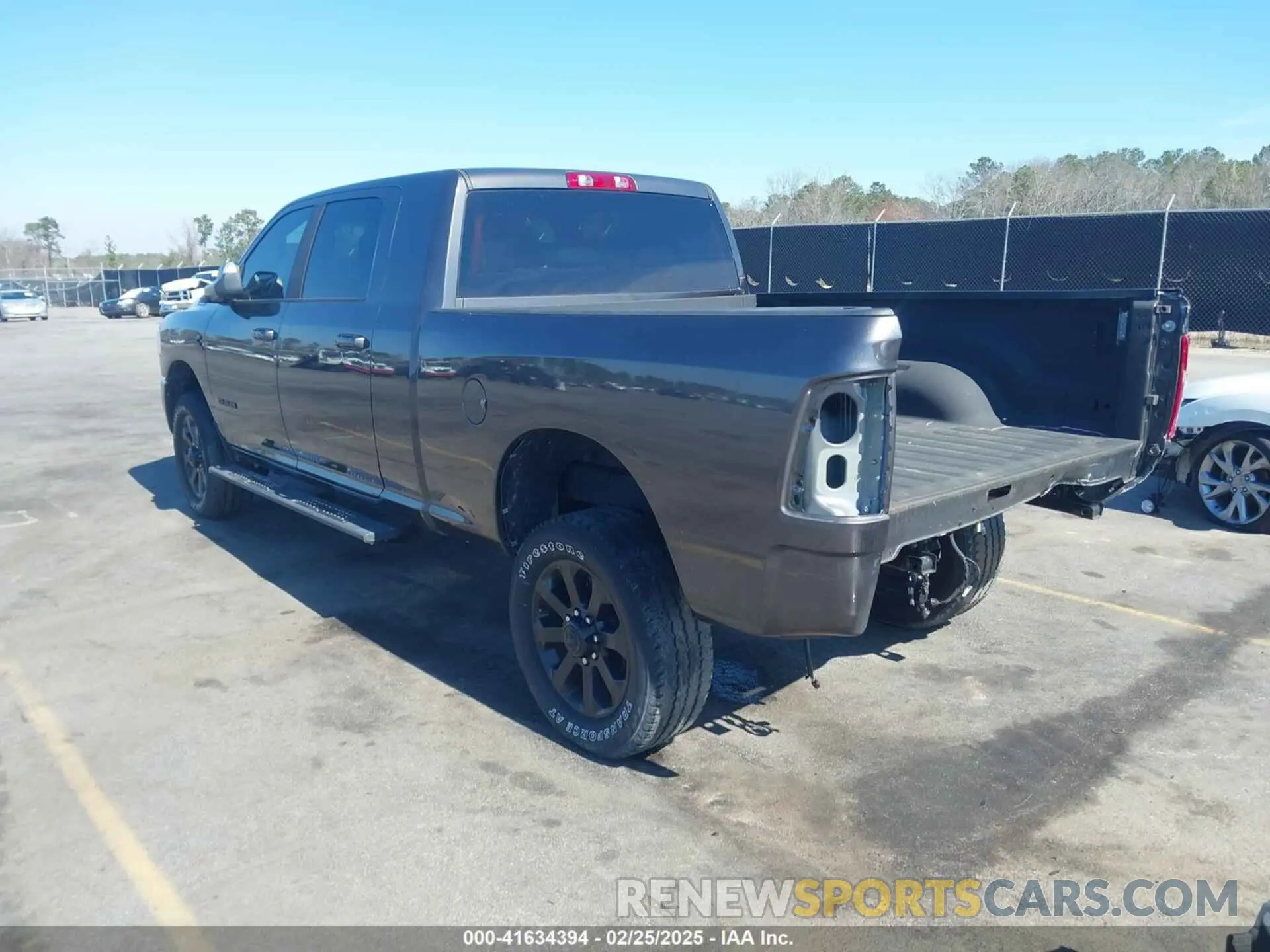 3 Photograph of a damaged car 3C6UR5ML7NG289963 RAM 2500 2022