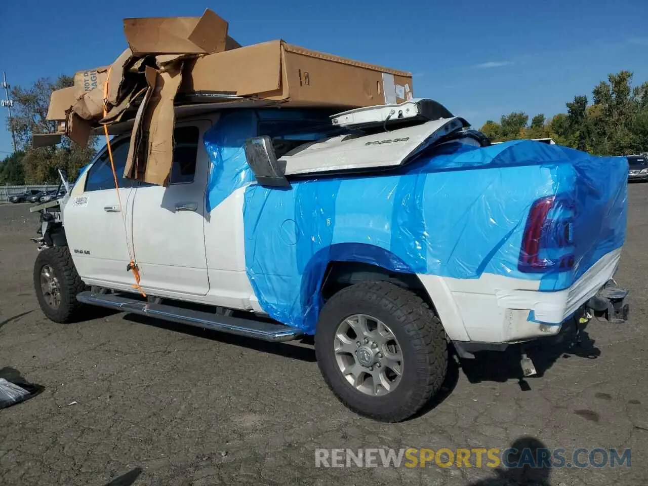 2 Photograph of a damaged car 3C6UR5NL7NG222536 RAM 2500 2022
