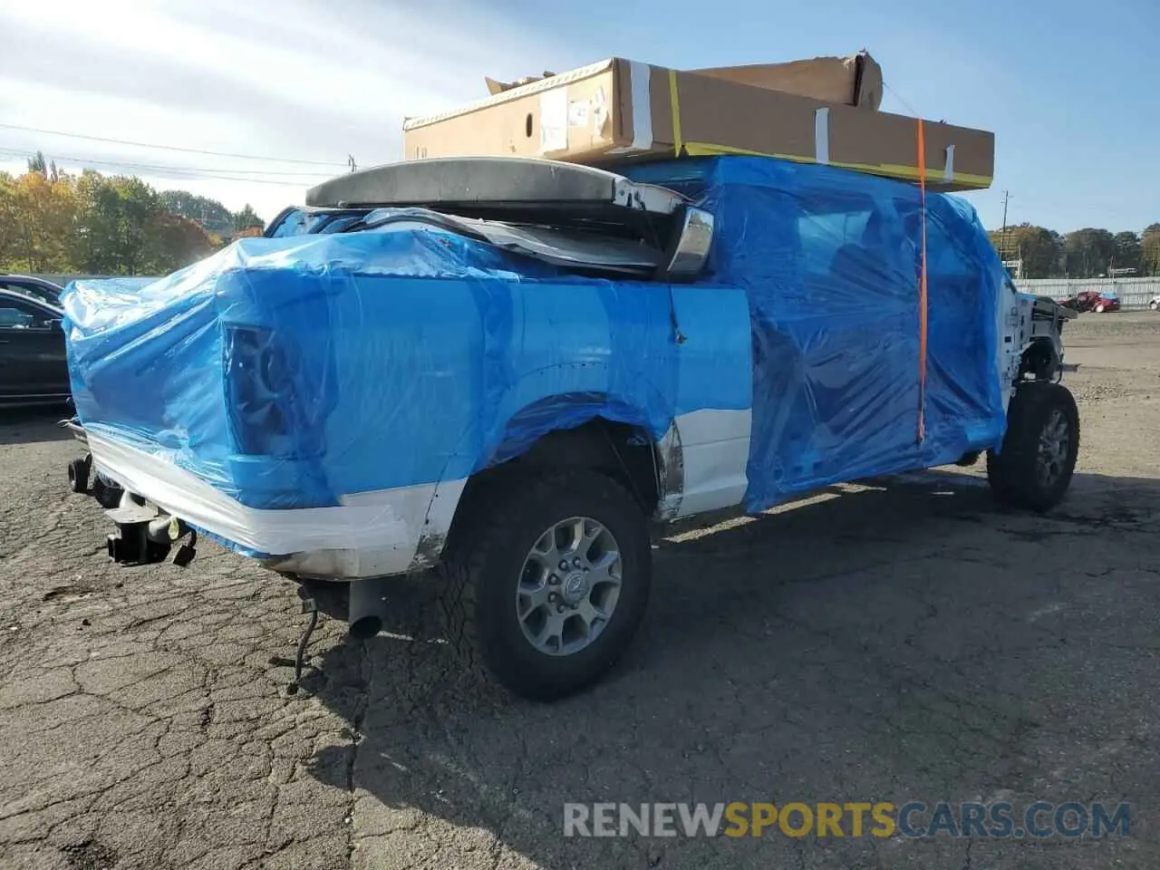 3 Photograph of a damaged car 3C6UR5NL7NG222536 RAM 2500 2022