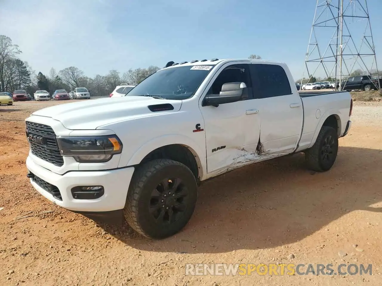 1 Photograph of a damaged car 3C6UR5SL4NG339401 RAM 2500 2022