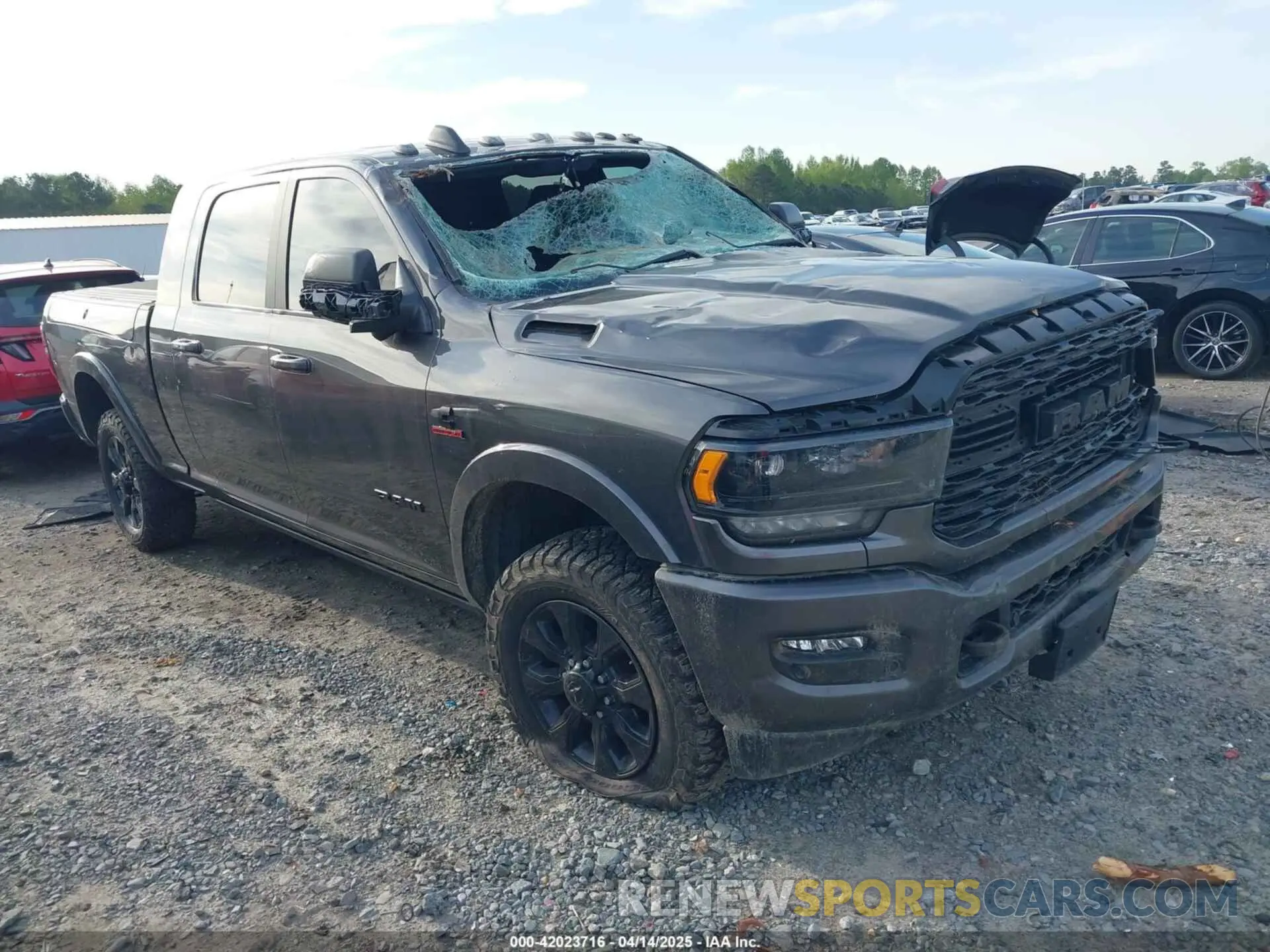 1 Photograph of a damaged car 3C6UR5TL9NG195293 RAM 2500 2022