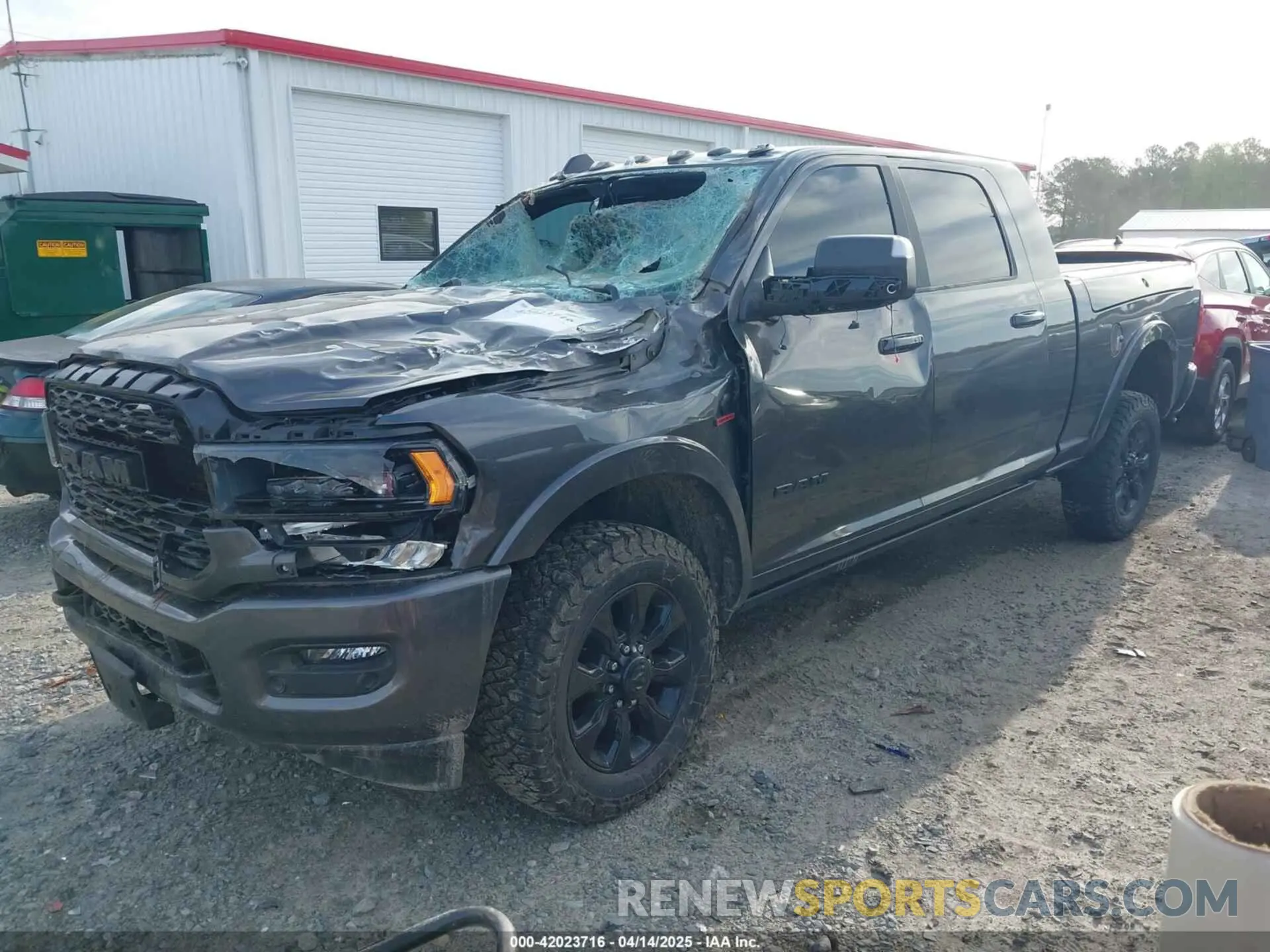 2 Photograph of a damaged car 3C6UR5TL9NG195293 RAM 2500 2022