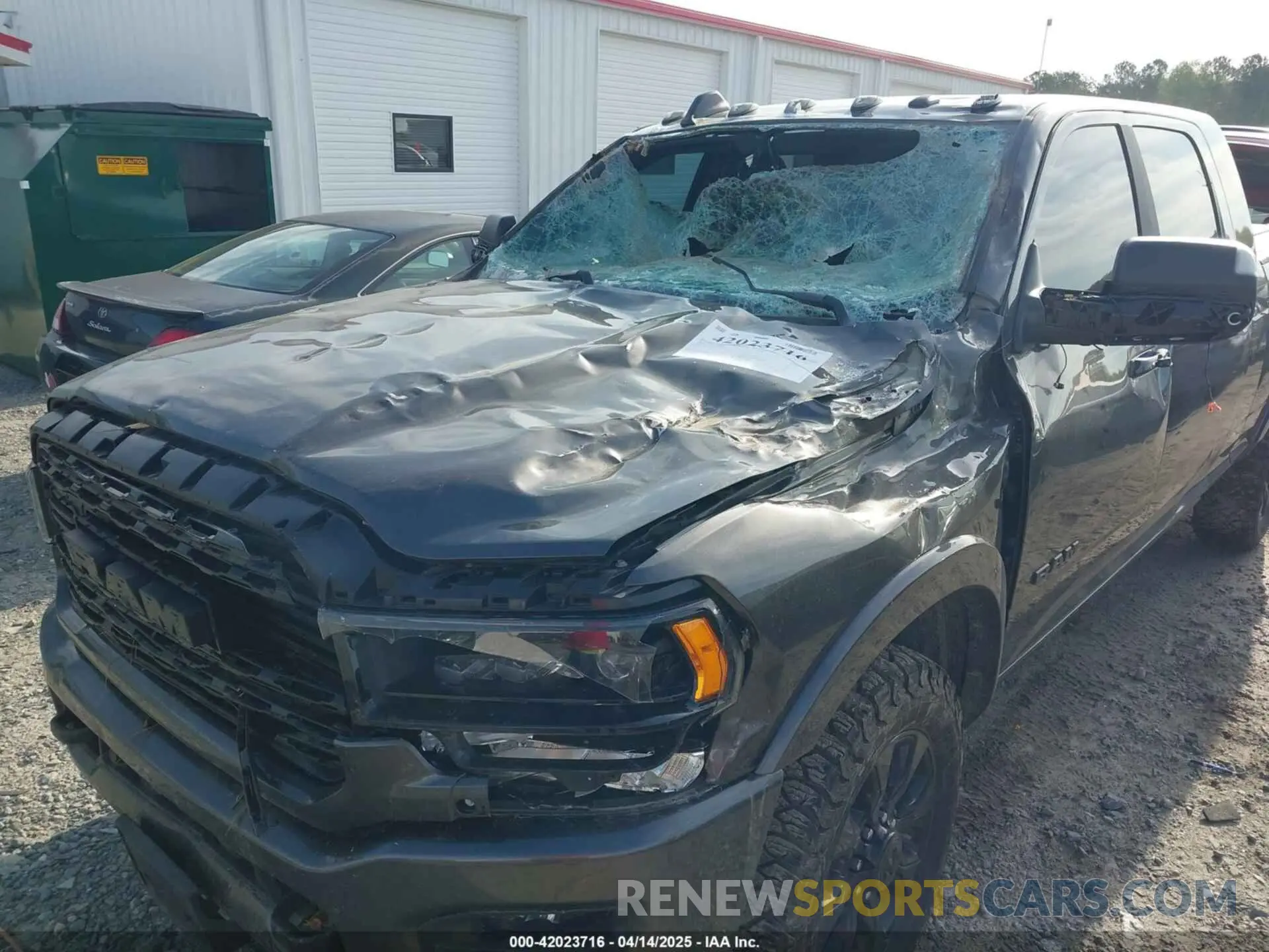 6 Photograph of a damaged car 3C6UR5TL9NG195293 RAM 2500 2022