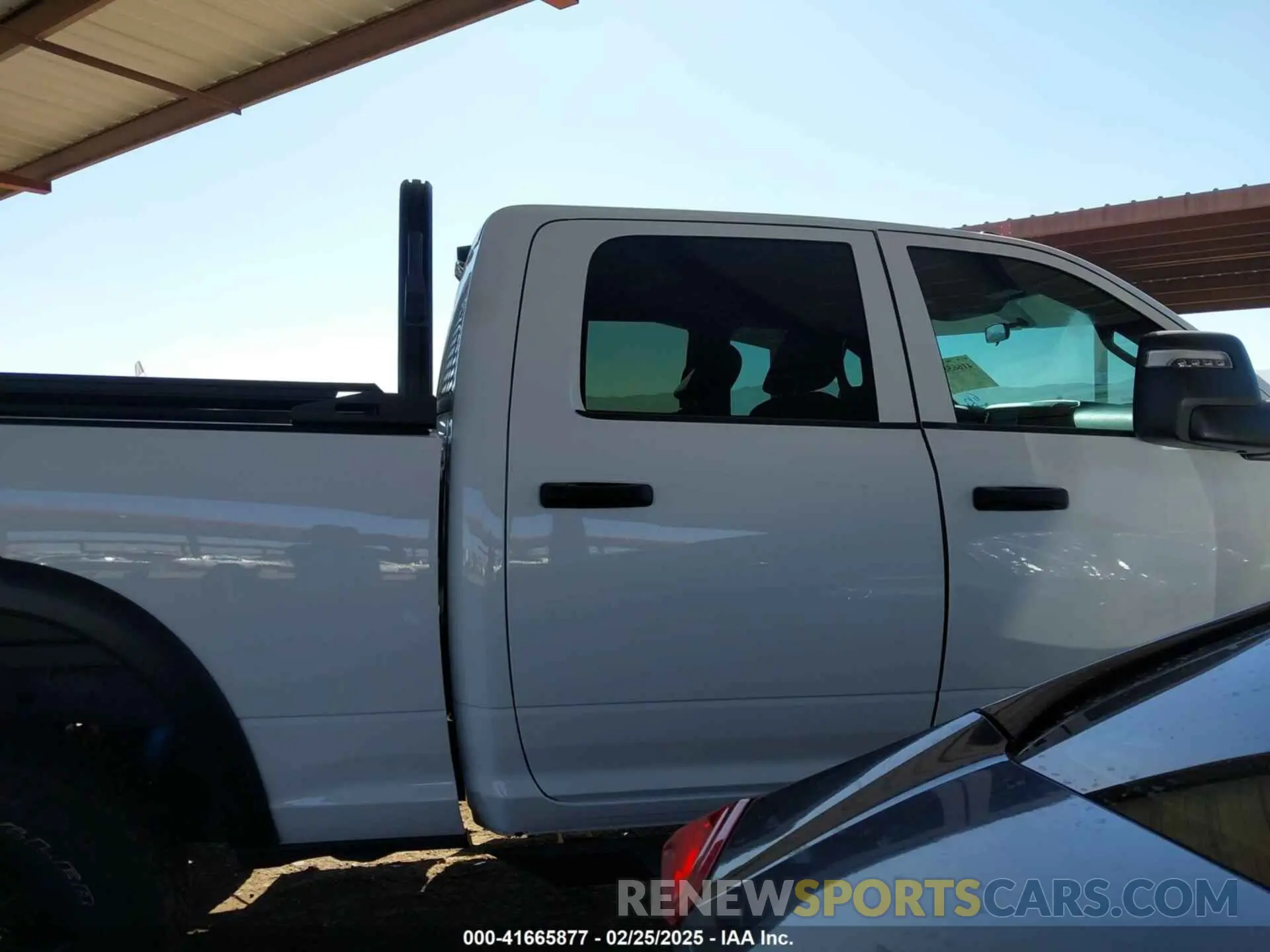 13 Photograph of a damaged car 3C6TR5CJ0PG518837 RAM 2500 2023