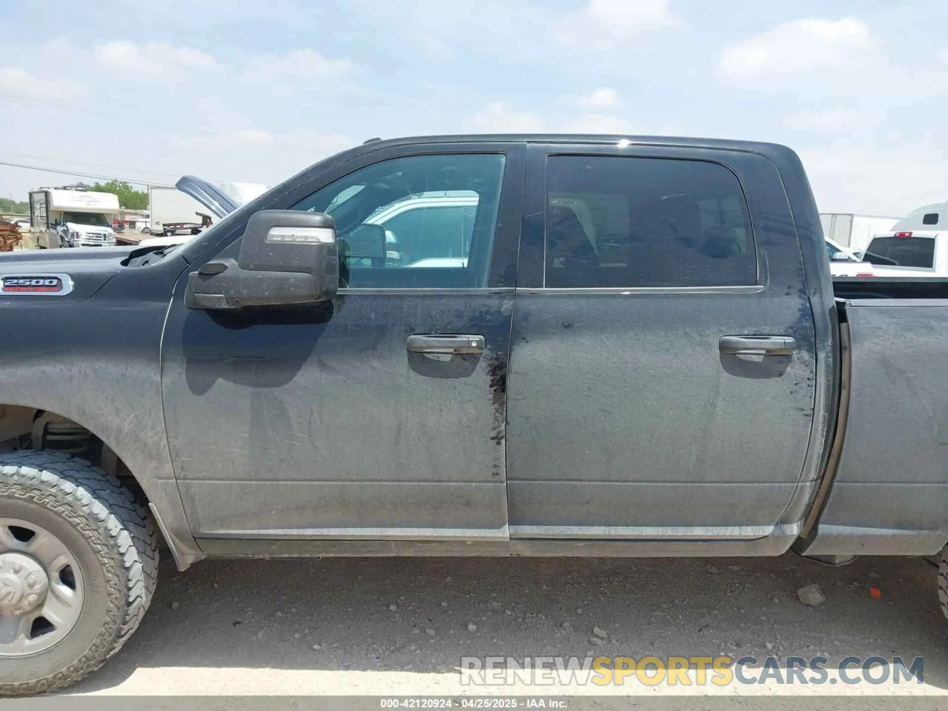 14 Photograph of a damaged car 3C6UR5CJ2PG532744 RAM 2500 2023