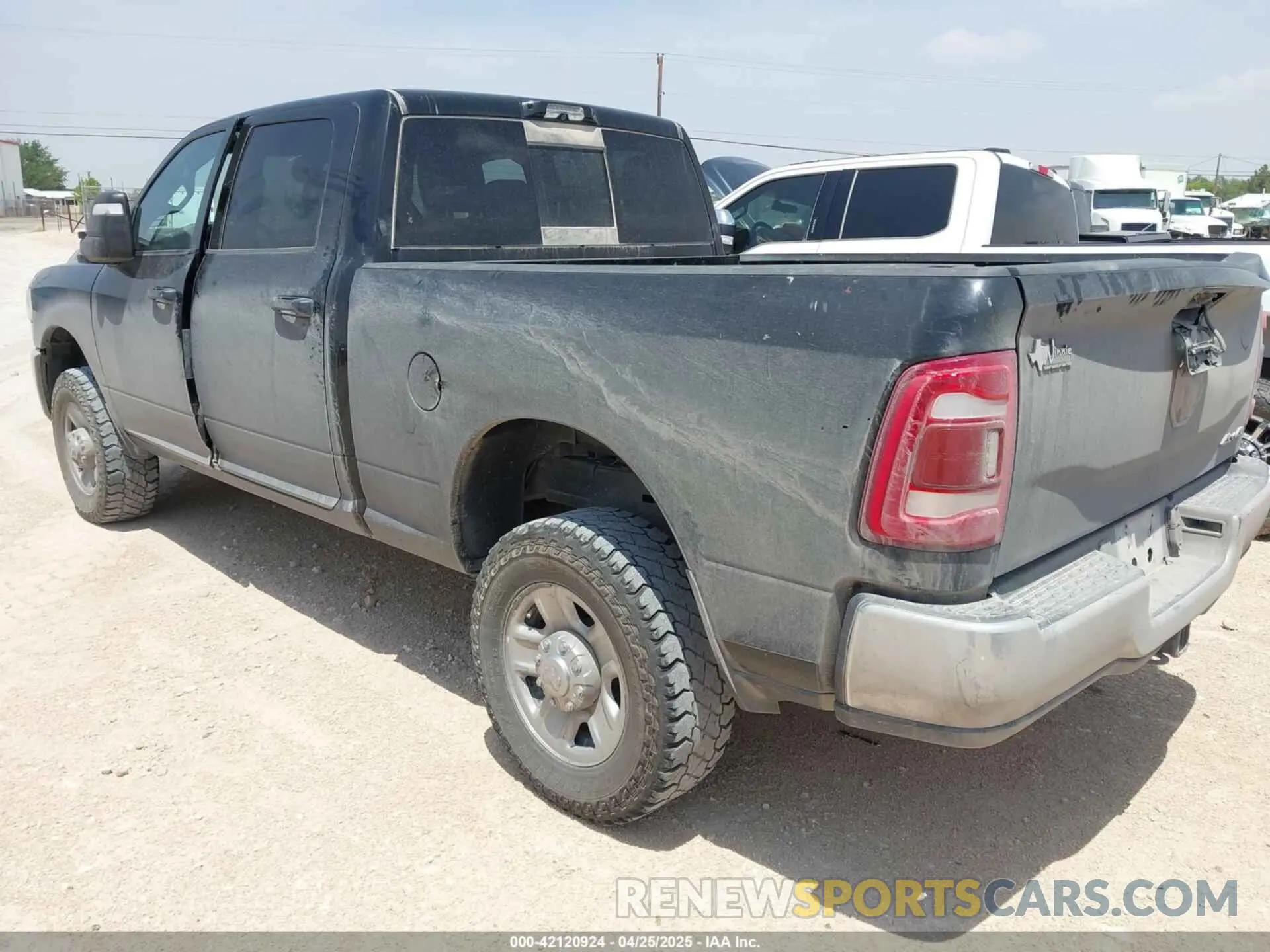 3 Photograph of a damaged car 3C6UR5CJ2PG532744 RAM 2500 2023