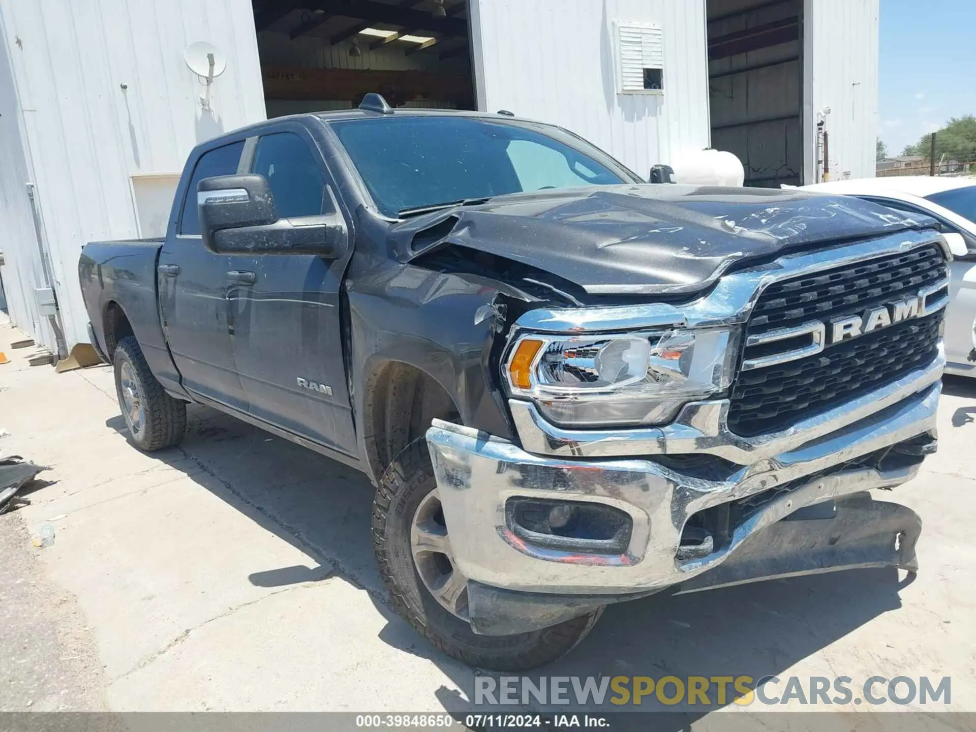 1 Photograph of a damaged car 3C6UR5DJ5PG548743 RAM 2500 2023