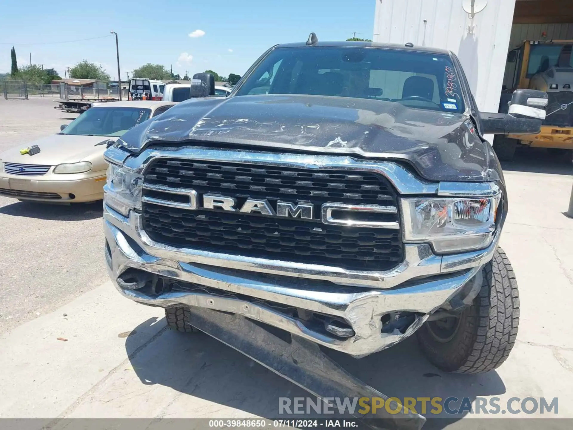 12 Photograph of a damaged car 3C6UR5DJ5PG548743 RAM 2500 2023