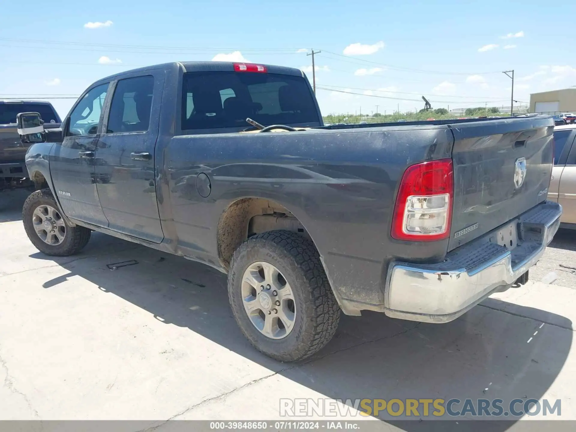 3 Photograph of a damaged car 3C6UR5DJ5PG548743 RAM 2500 2023
