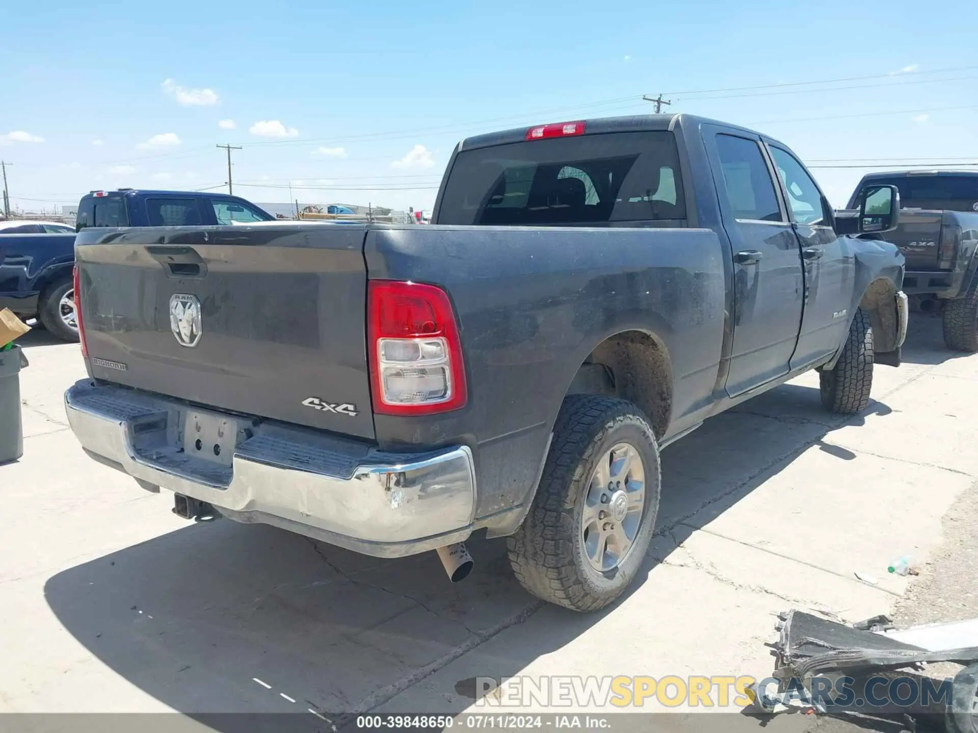 4 Photograph of a damaged car 3C6UR5DJ5PG548743 RAM 2500 2023