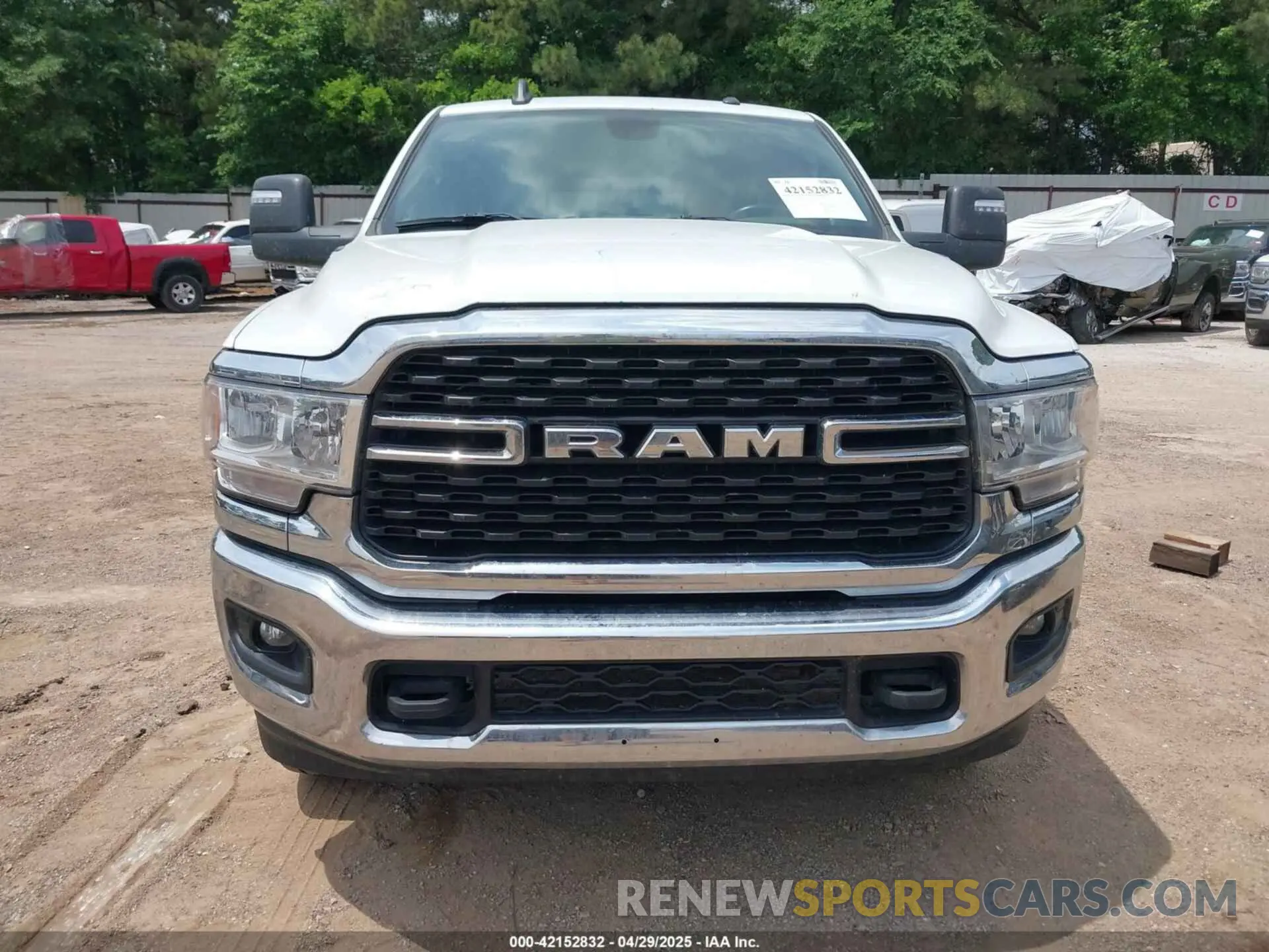 12 Photograph of a damaged car 3C6UR5DJXPG632878 RAM 2500 2023
