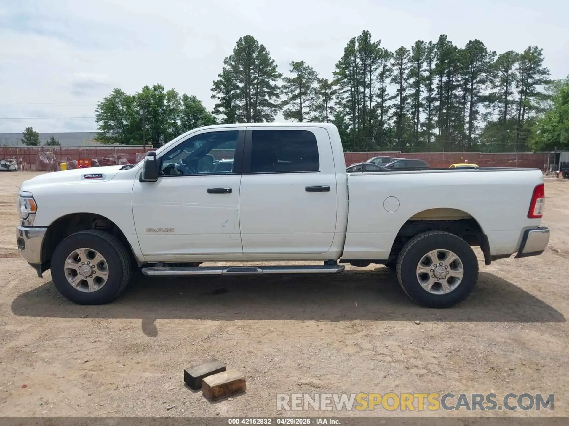 14 Photograph of a damaged car 3C6UR5DJXPG632878 RAM 2500 2023