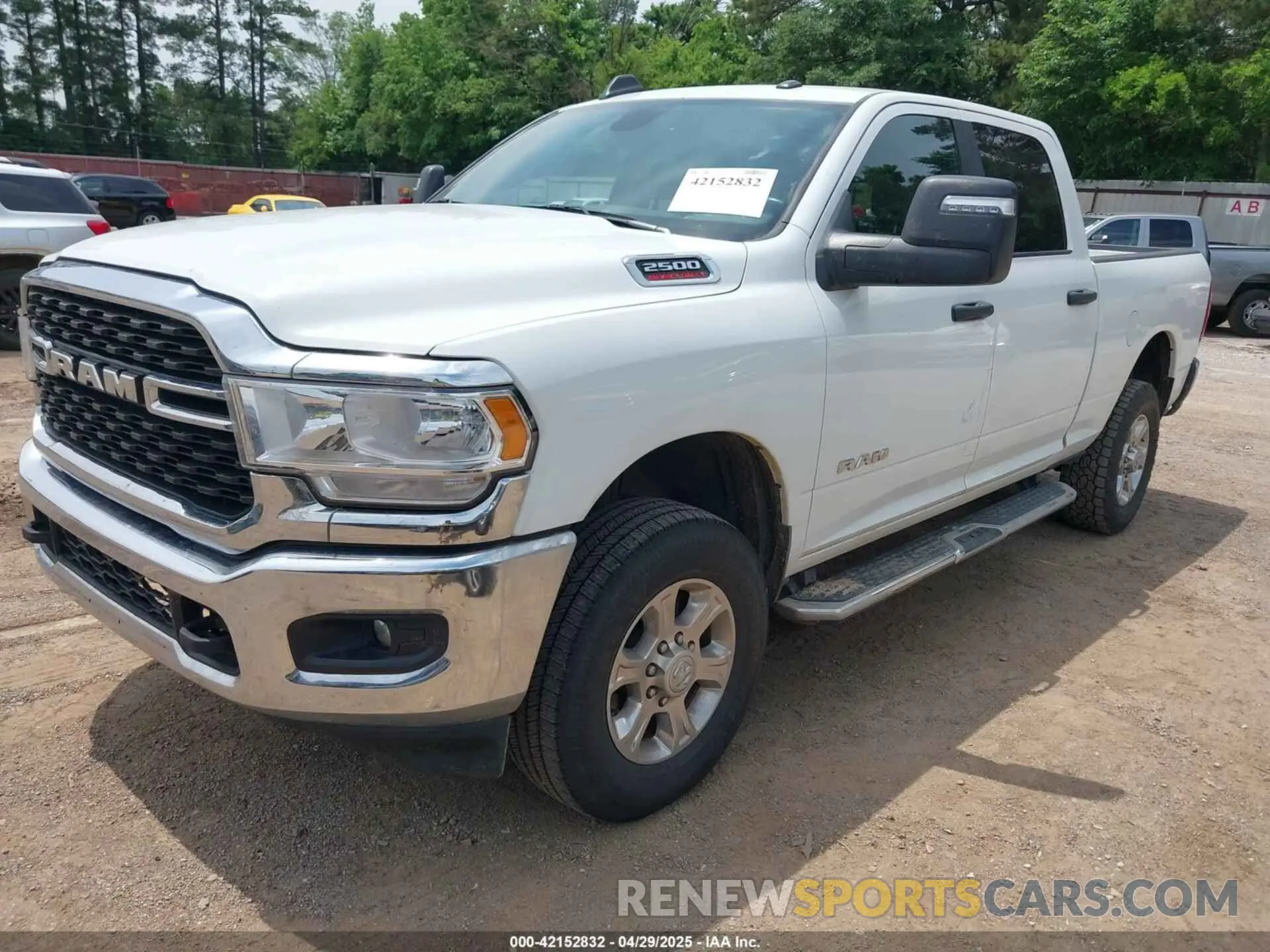 2 Photograph of a damaged car 3C6UR5DJXPG632878 RAM 2500 2023