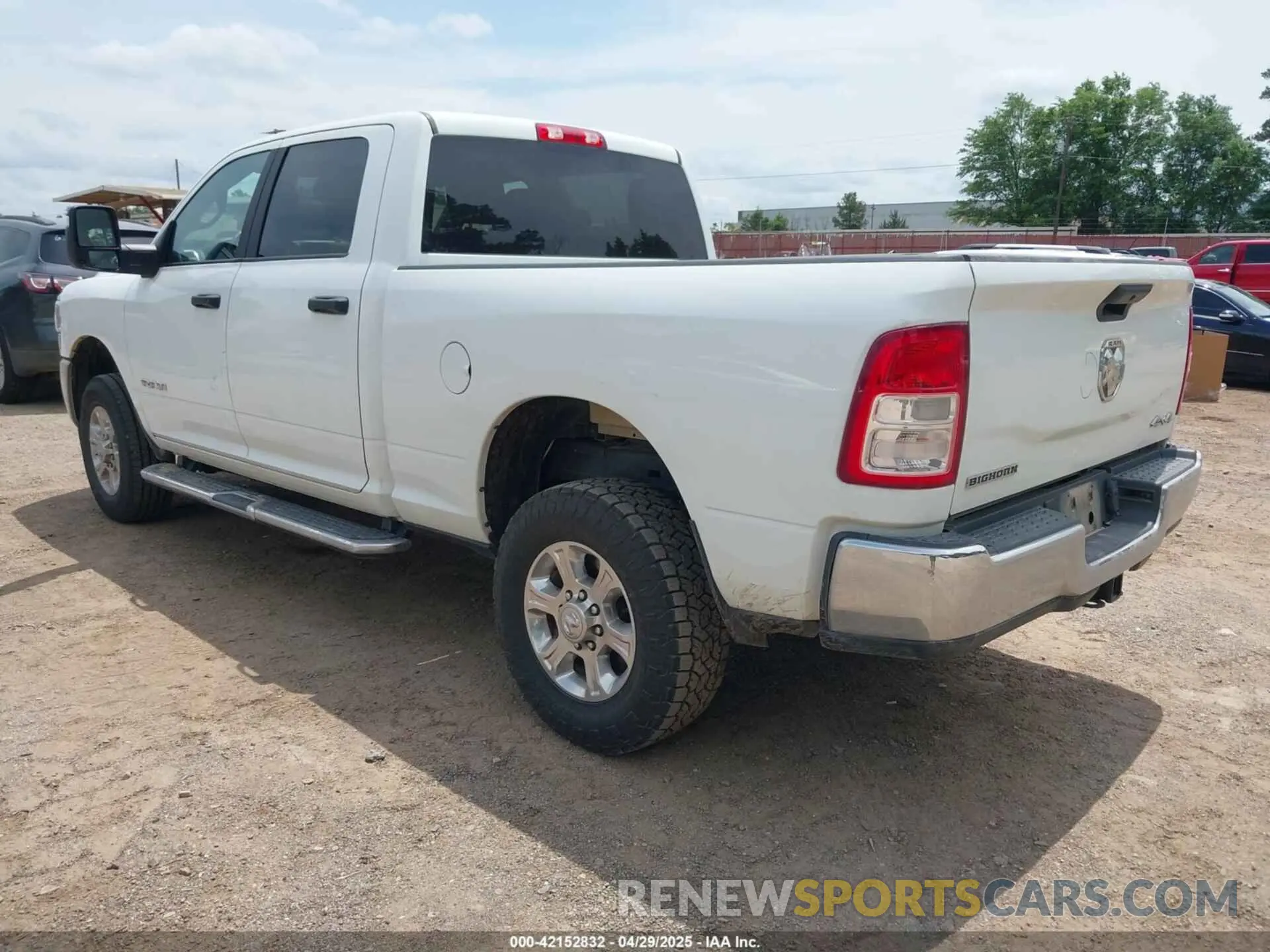 3 Photograph of a damaged car 3C6UR5DJXPG632878 RAM 2500 2023