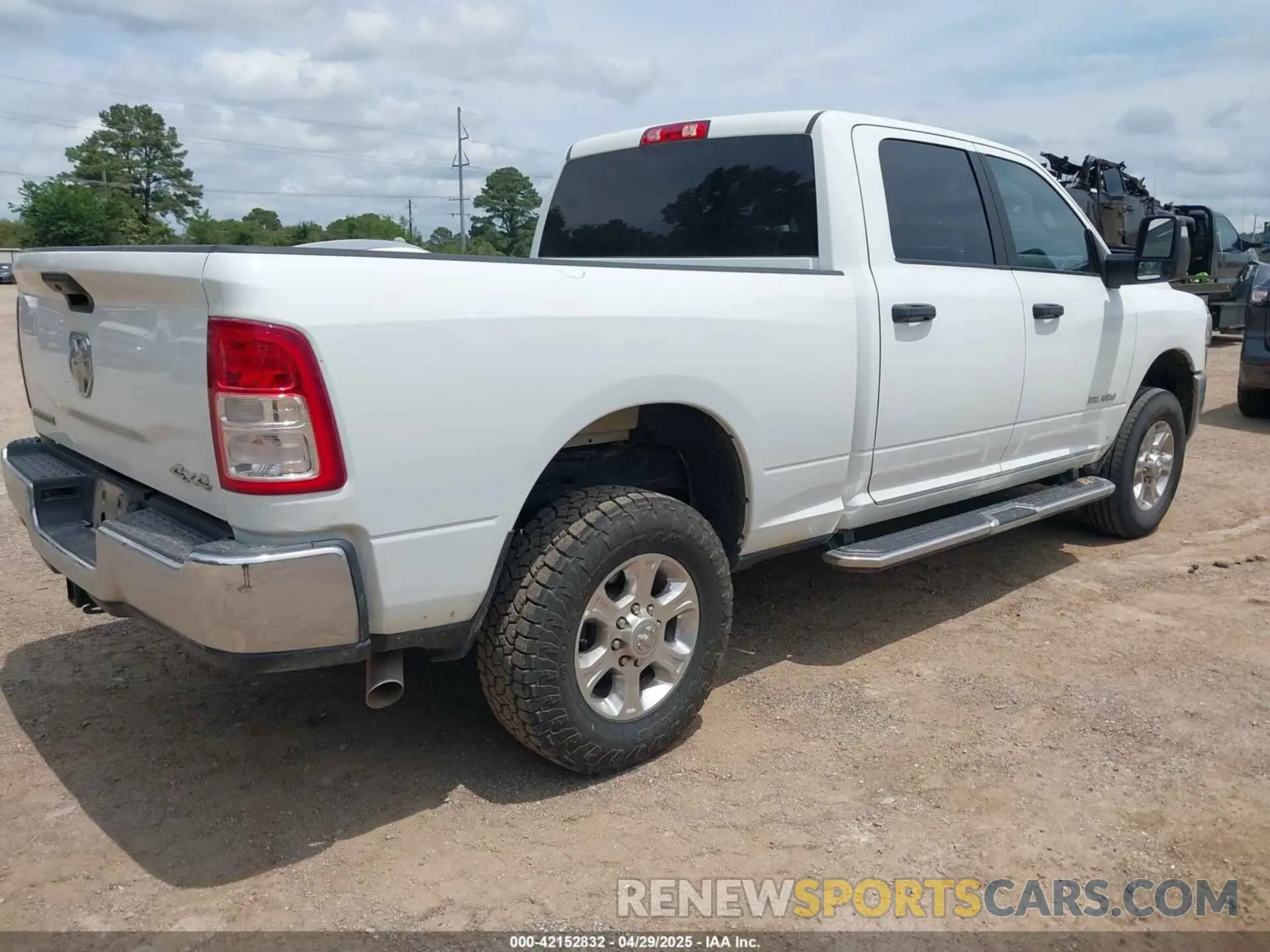 4 Photograph of a damaged car 3C6UR5DJXPG632878 RAM 2500 2023