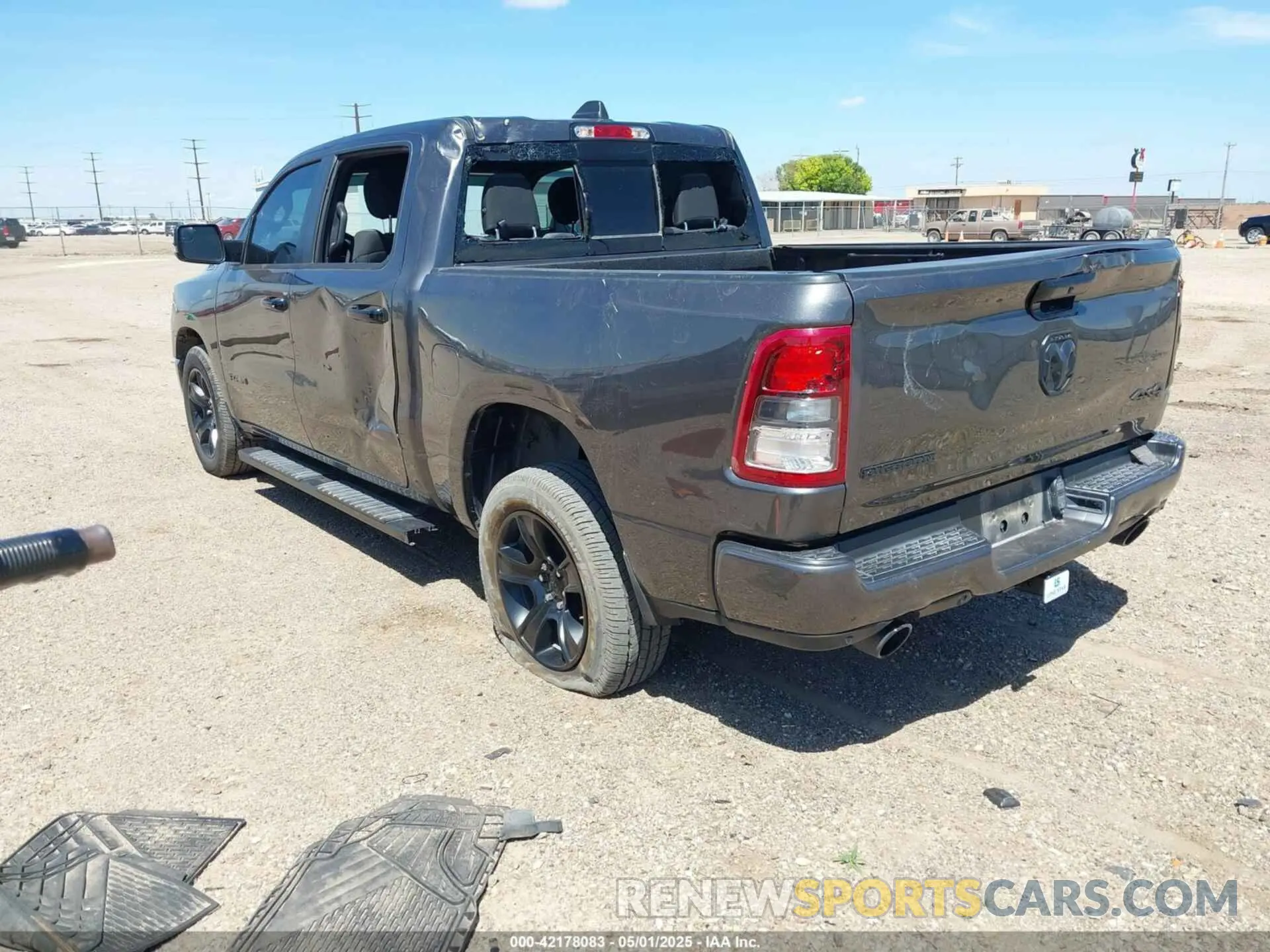 3 Photograph of a damaged car 3C6UR5DL1PG654074 RAM 2500 2023