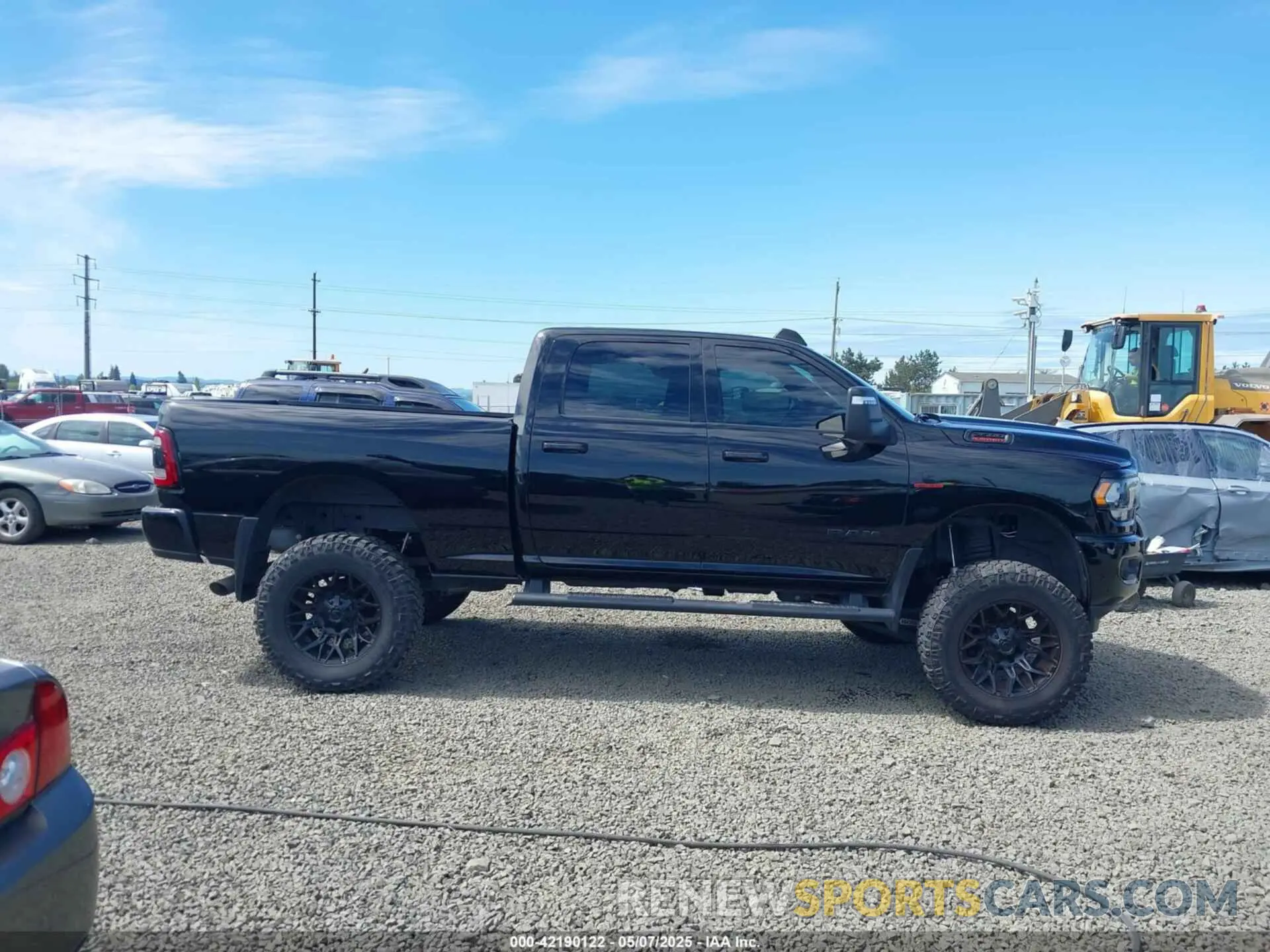 13 Photograph of a damaged car 3C6UR5DL3PG635901 RAM 2500 2023