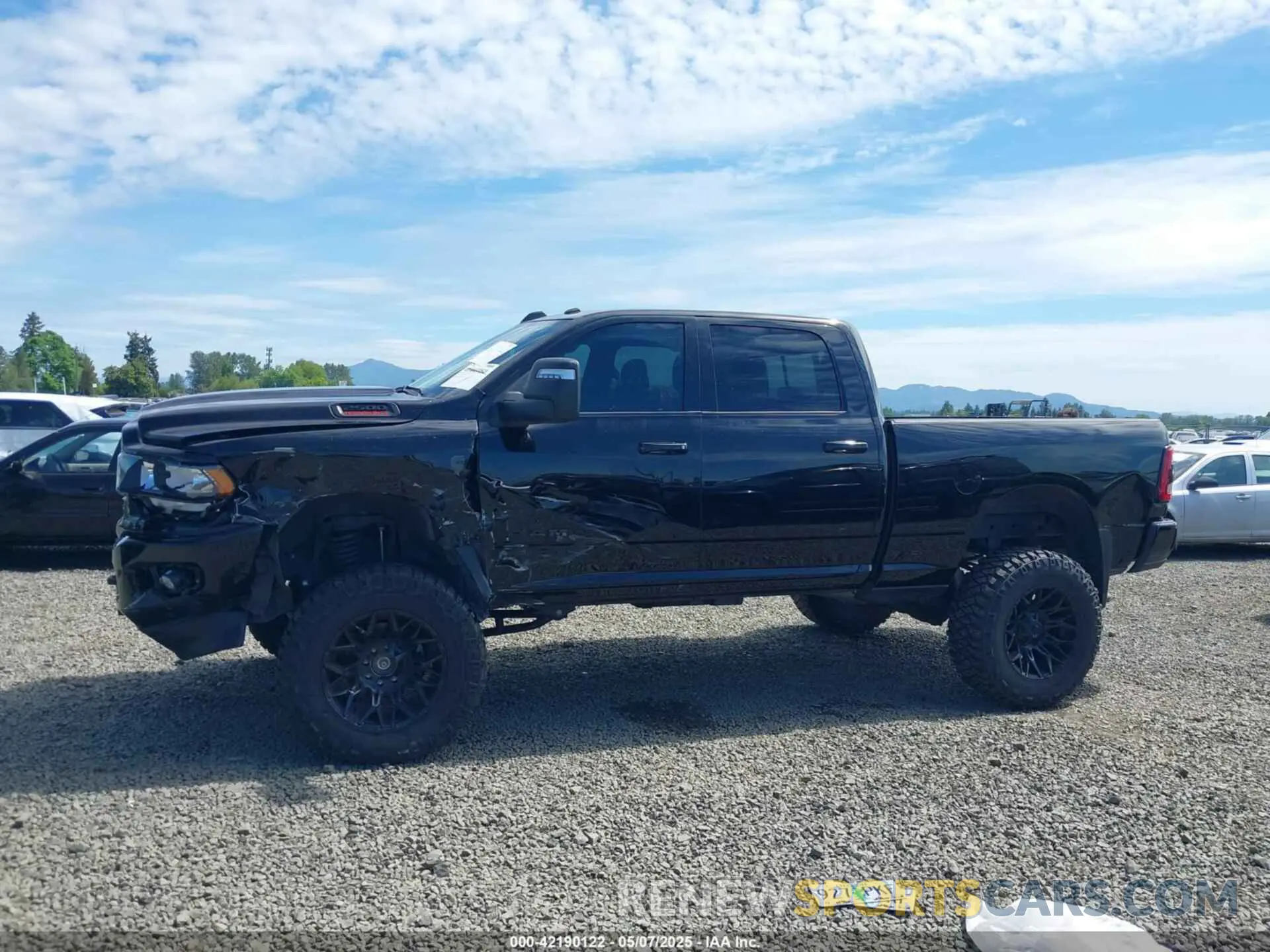 14 Photograph of a damaged car 3C6UR5DL3PG635901 RAM 2500 2023