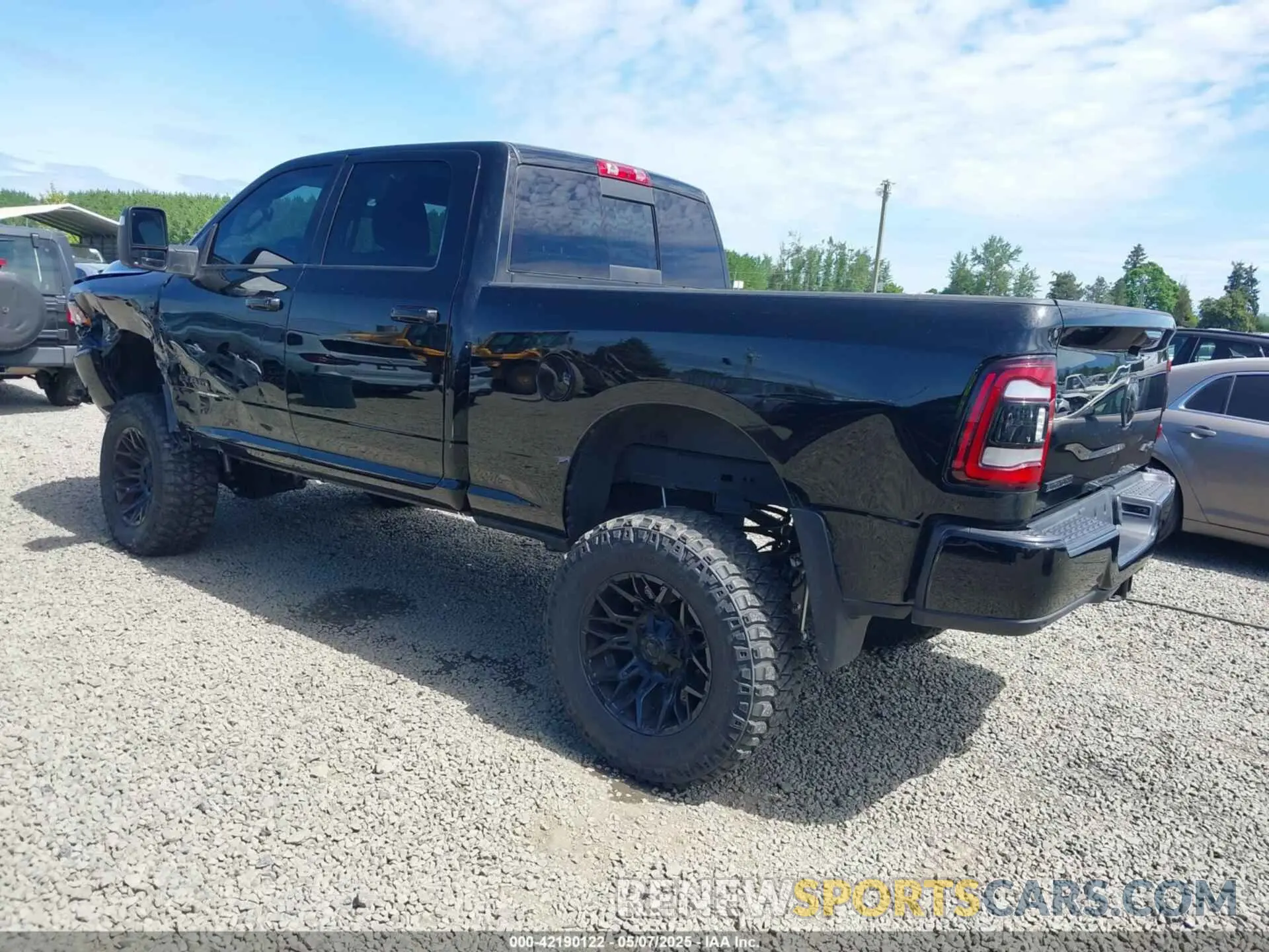 3 Photograph of a damaged car 3C6UR5DL3PG635901 RAM 2500 2023