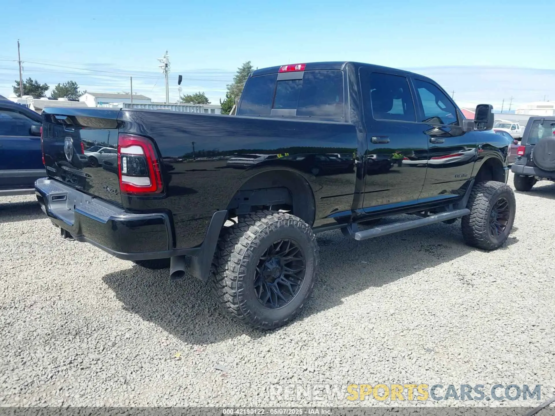 4 Photograph of a damaged car 3C6UR5DL3PG635901 RAM 2500 2023