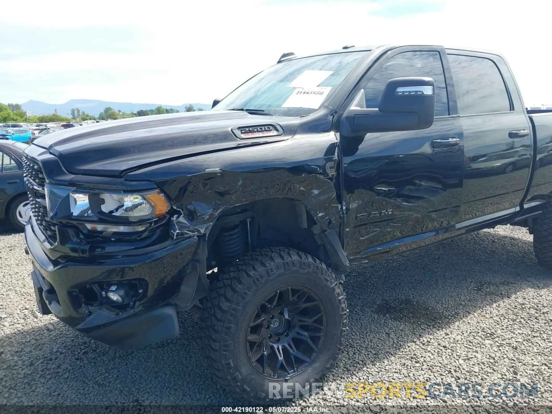 6 Photograph of a damaged car 3C6UR5DL3PG635901 RAM 2500 2023