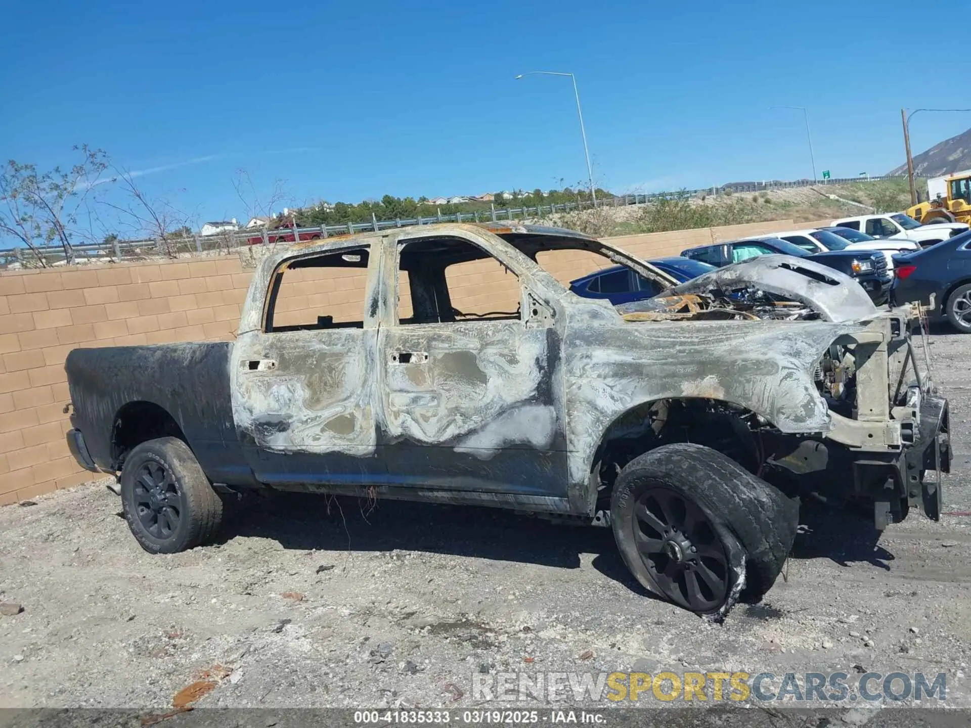 12 Photograph of a damaged car 3C6UR5DL5PG514867 RAM 2500 2023