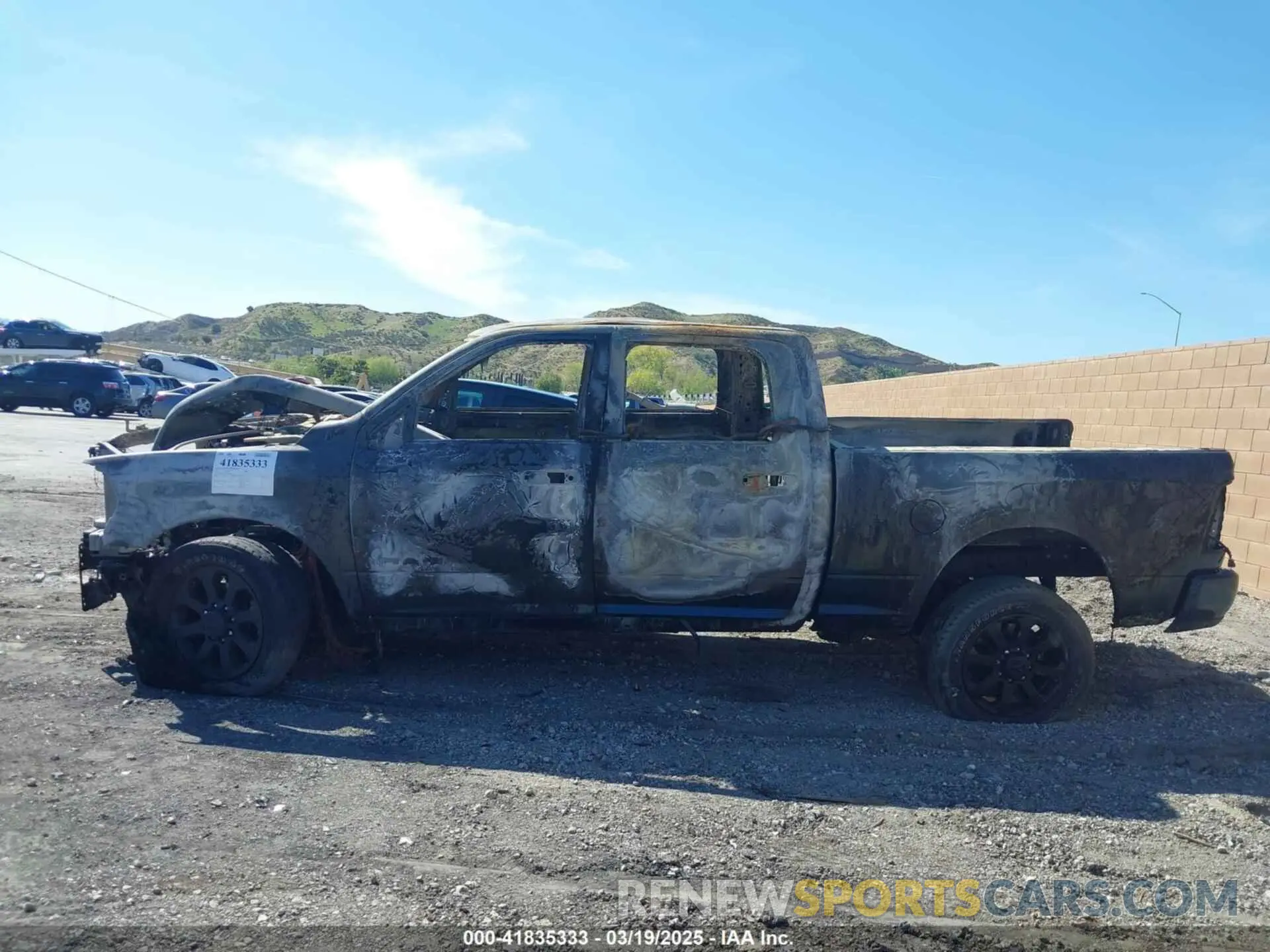 13 Photograph of a damaged car 3C6UR5DL5PG514867 RAM 2500 2023
