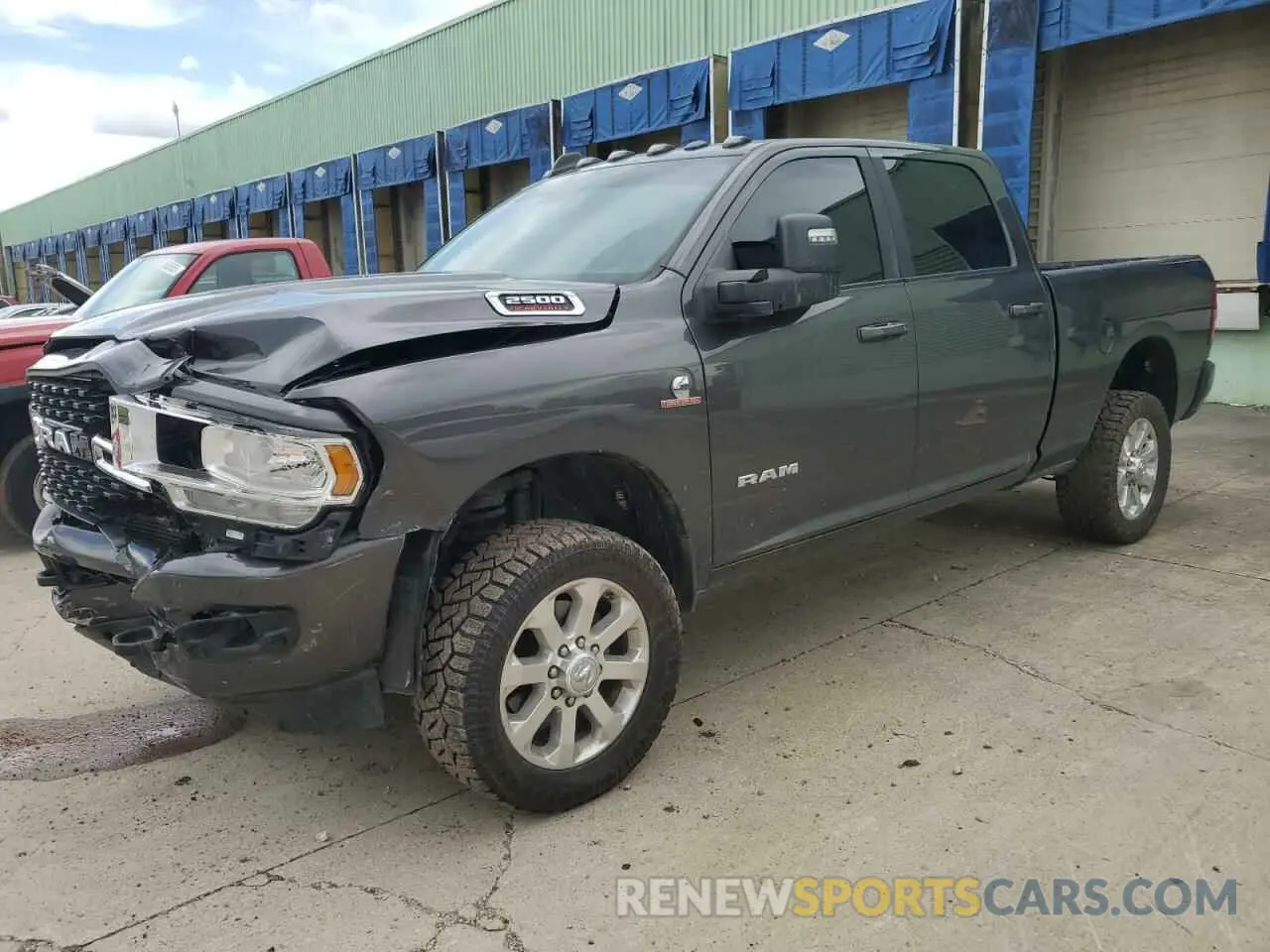 1 Photograph of a damaged car 3C6UR5DL7PG517320 RAM 2500 2023