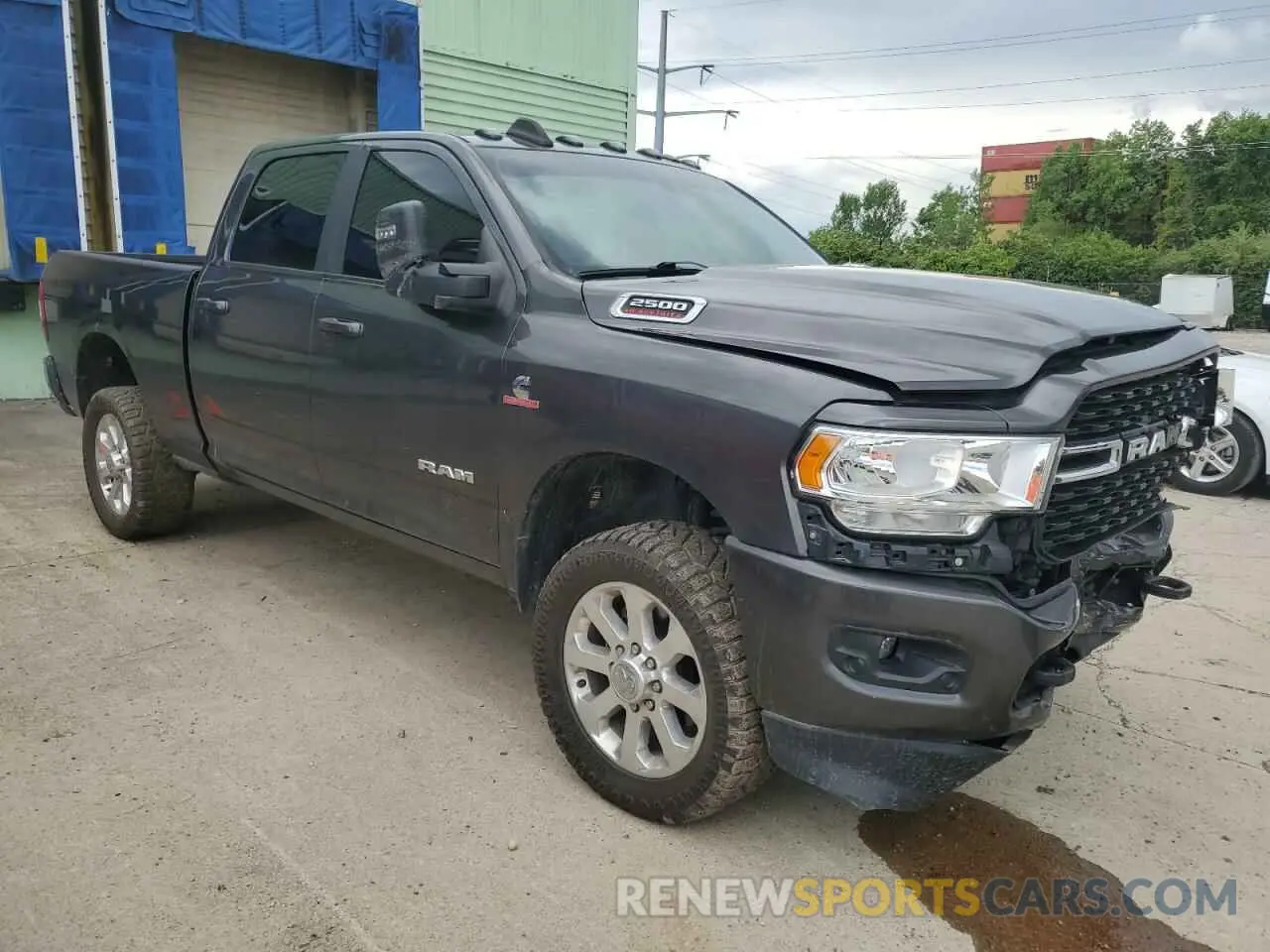 4 Photograph of a damaged car 3C6UR5DL7PG517320 RAM 2500 2023