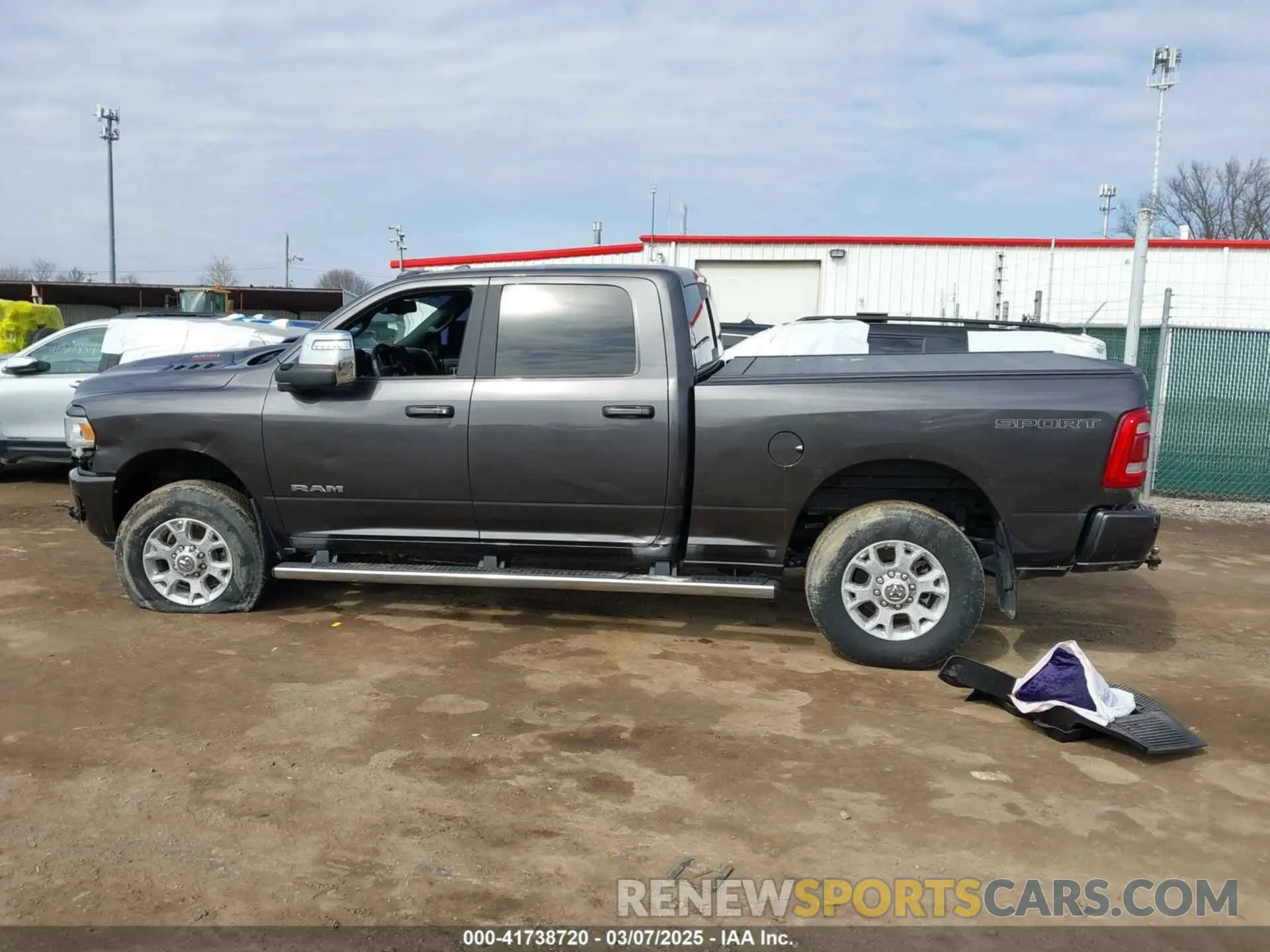 14 Photograph of a damaged car 3C6UR5FJ6PG614424 RAM 2500 2023