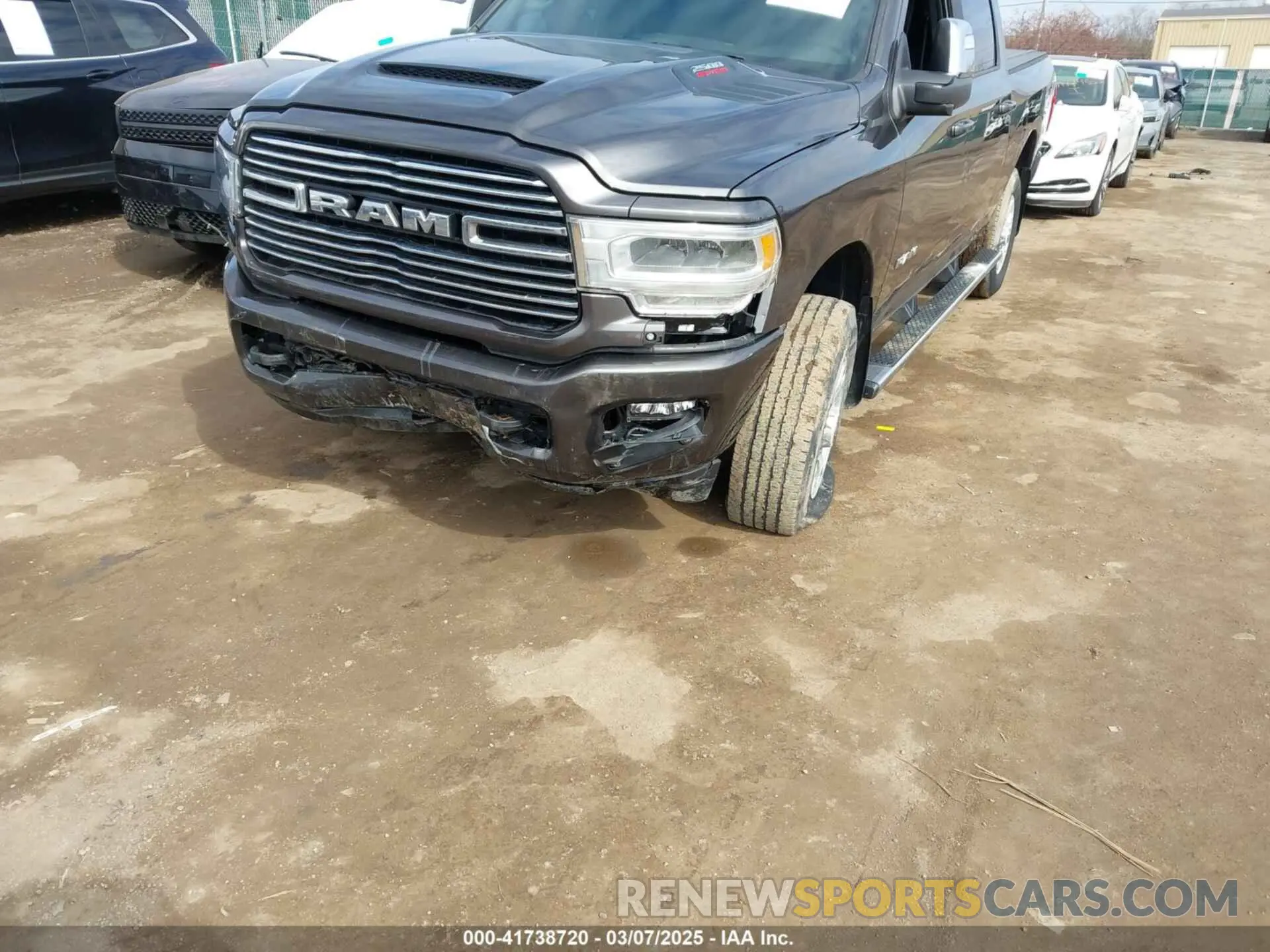 6 Photograph of a damaged car 3C6UR5FJ6PG614424 RAM 2500 2023