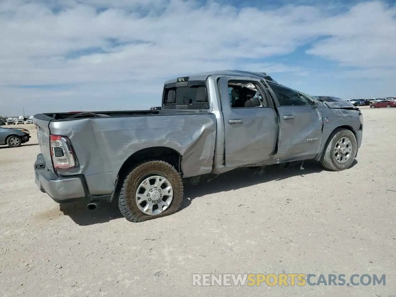 3 Photograph of a damaged car 3C6UR5FL3PG517747 RAM 2500 2023