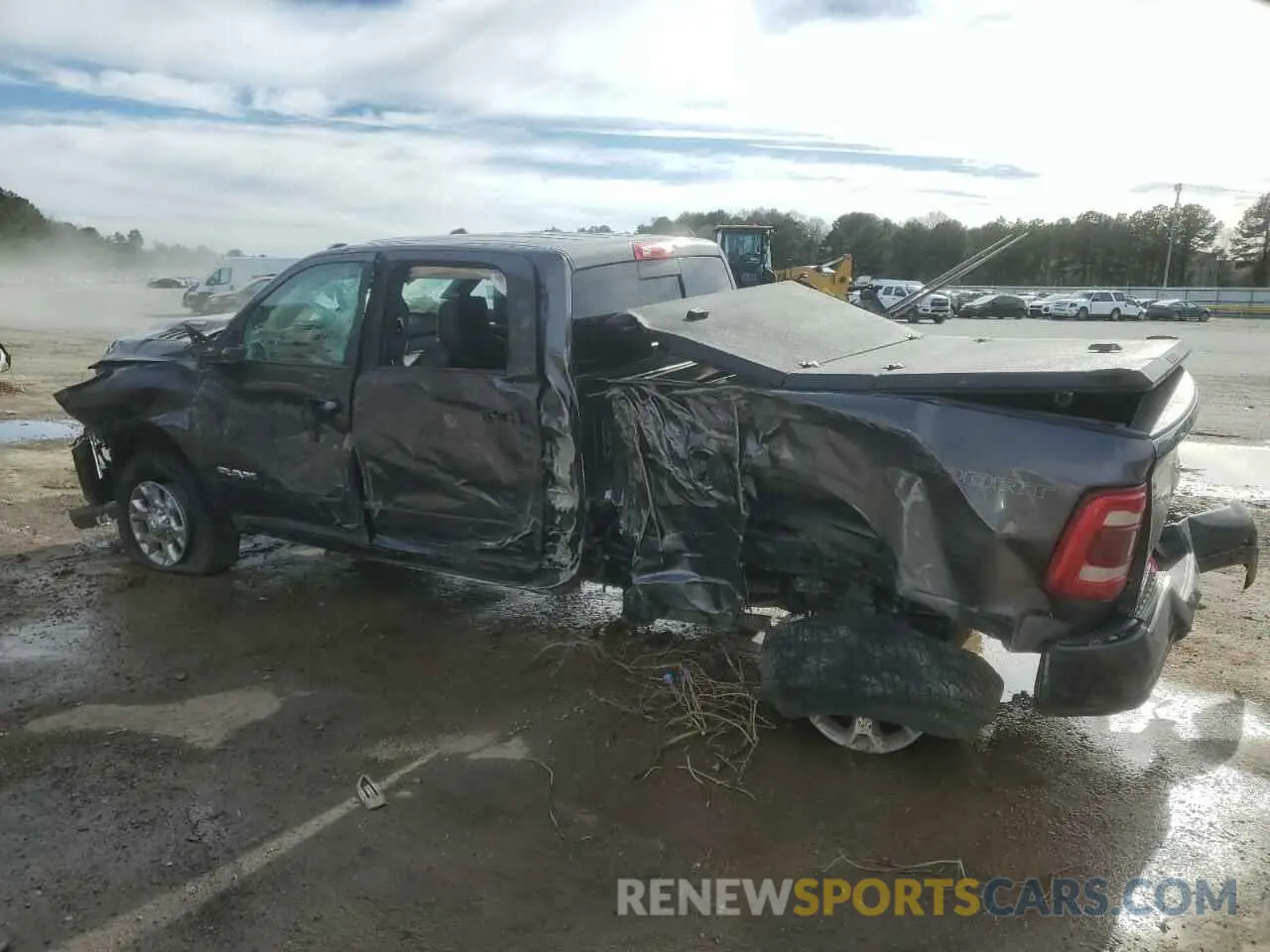 2 Photograph of a damaged car 3C6UR5FL3PG540235 RAM 2500 2023