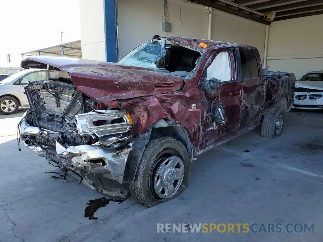 1 Photograph of a damaged car 3C6UR5FL6PG569132 RAM 2500 2023