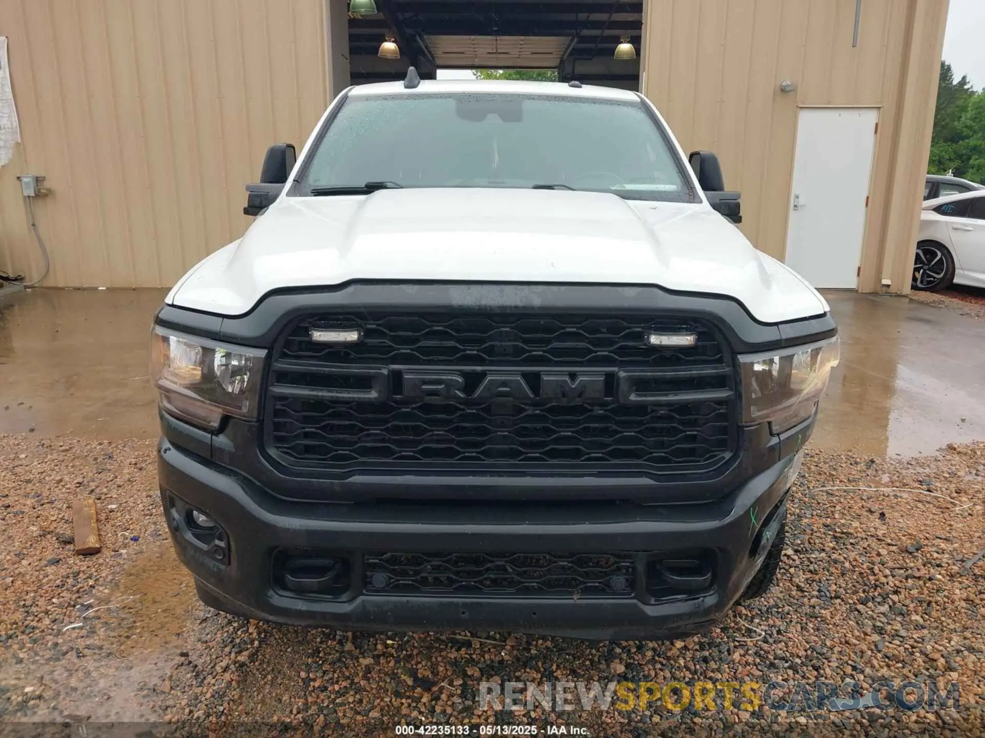 12 Photograph of a damaged car 3C6UR5HJ4PG536920 RAM 2500 2023