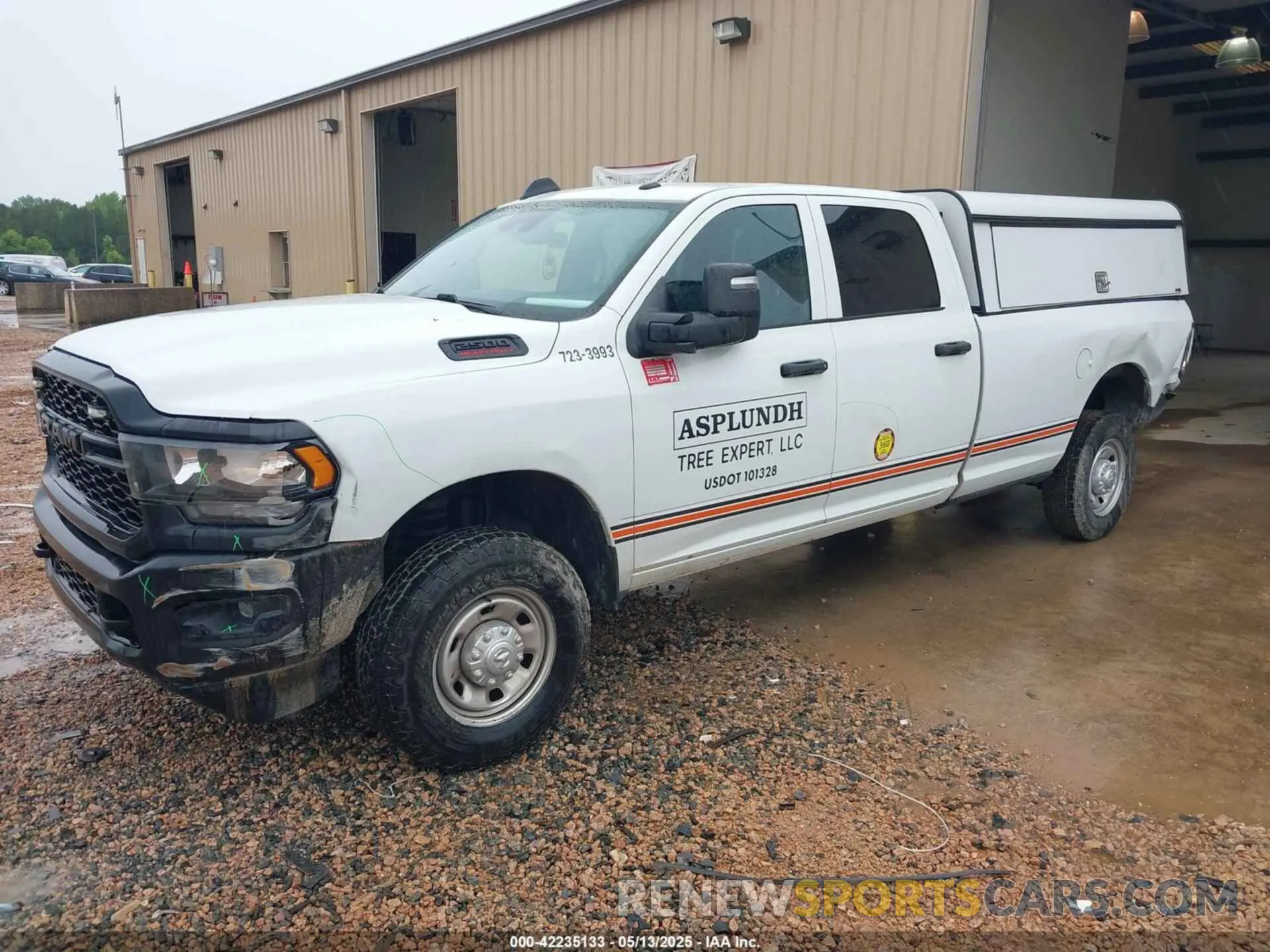 2 Photograph of a damaged car 3C6UR5HJ4PG536920 RAM 2500 2023