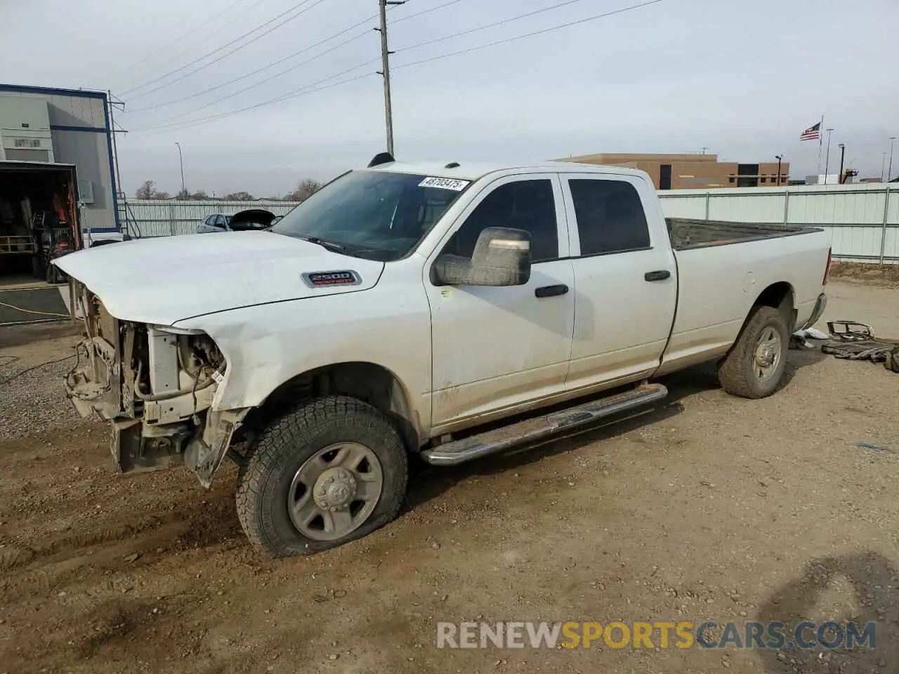 1 Photograph of a damaged car 3C6UR5HJ6PG500730 RAM 2500 2023