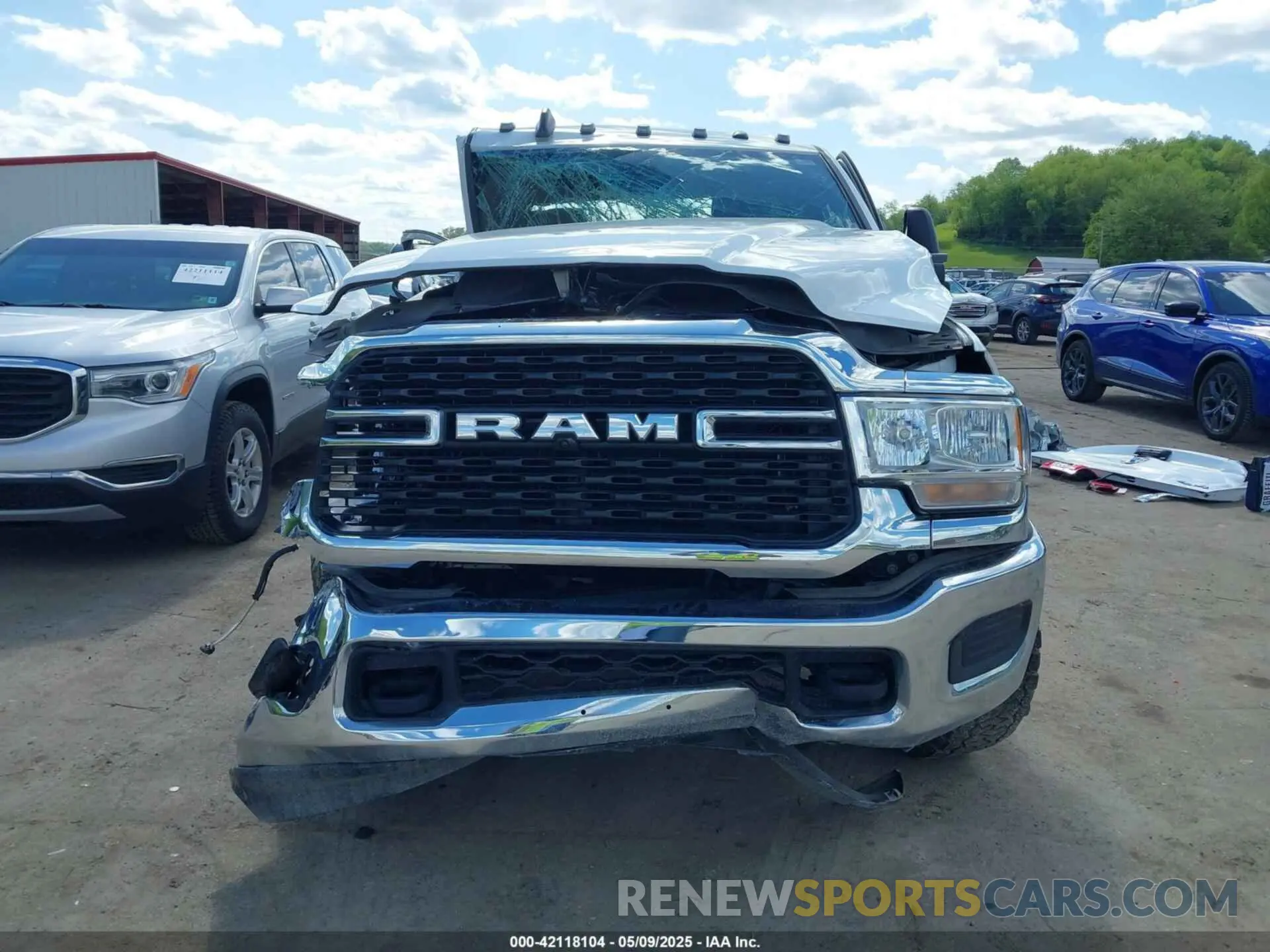 13 Photograph of a damaged car 3C6UR5HJ9PG564714 RAM 2500 2023