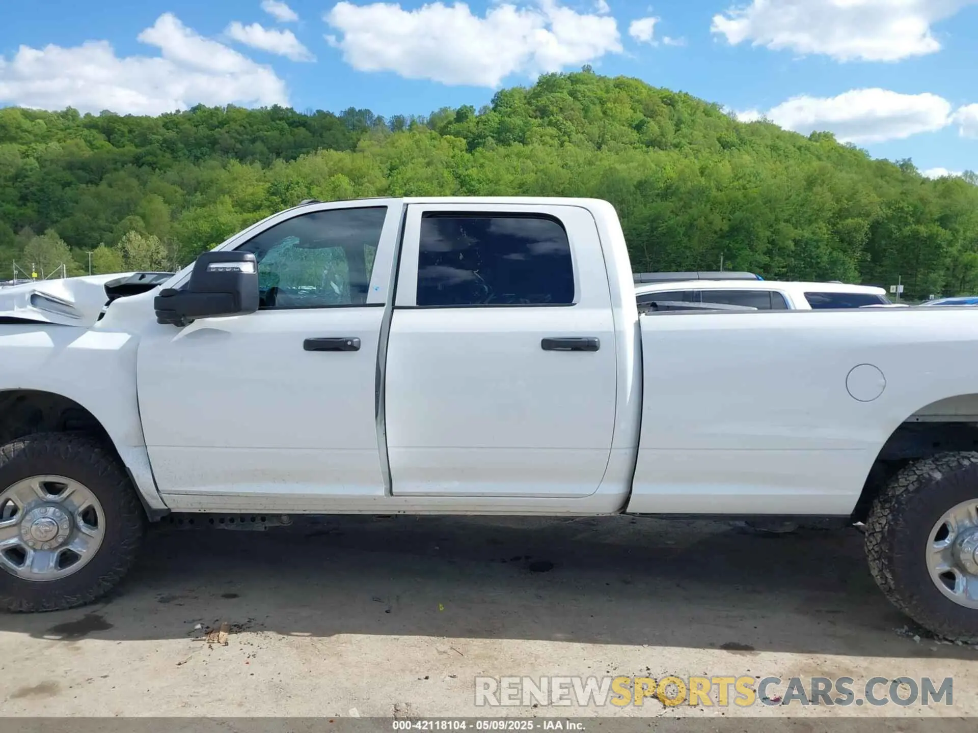 15 Photograph of a damaged car 3C6UR5HJ9PG564714 RAM 2500 2023