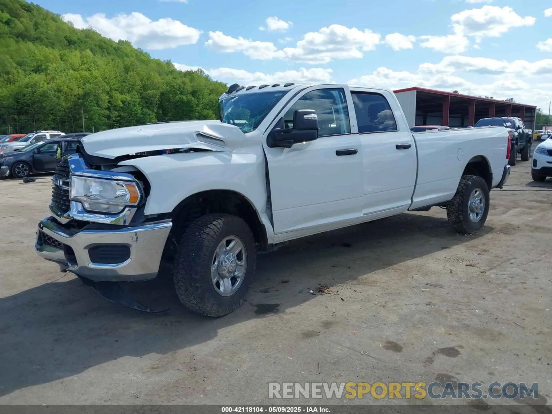 2 Photograph of a damaged car 3C6UR5HJ9PG564714 RAM 2500 2023