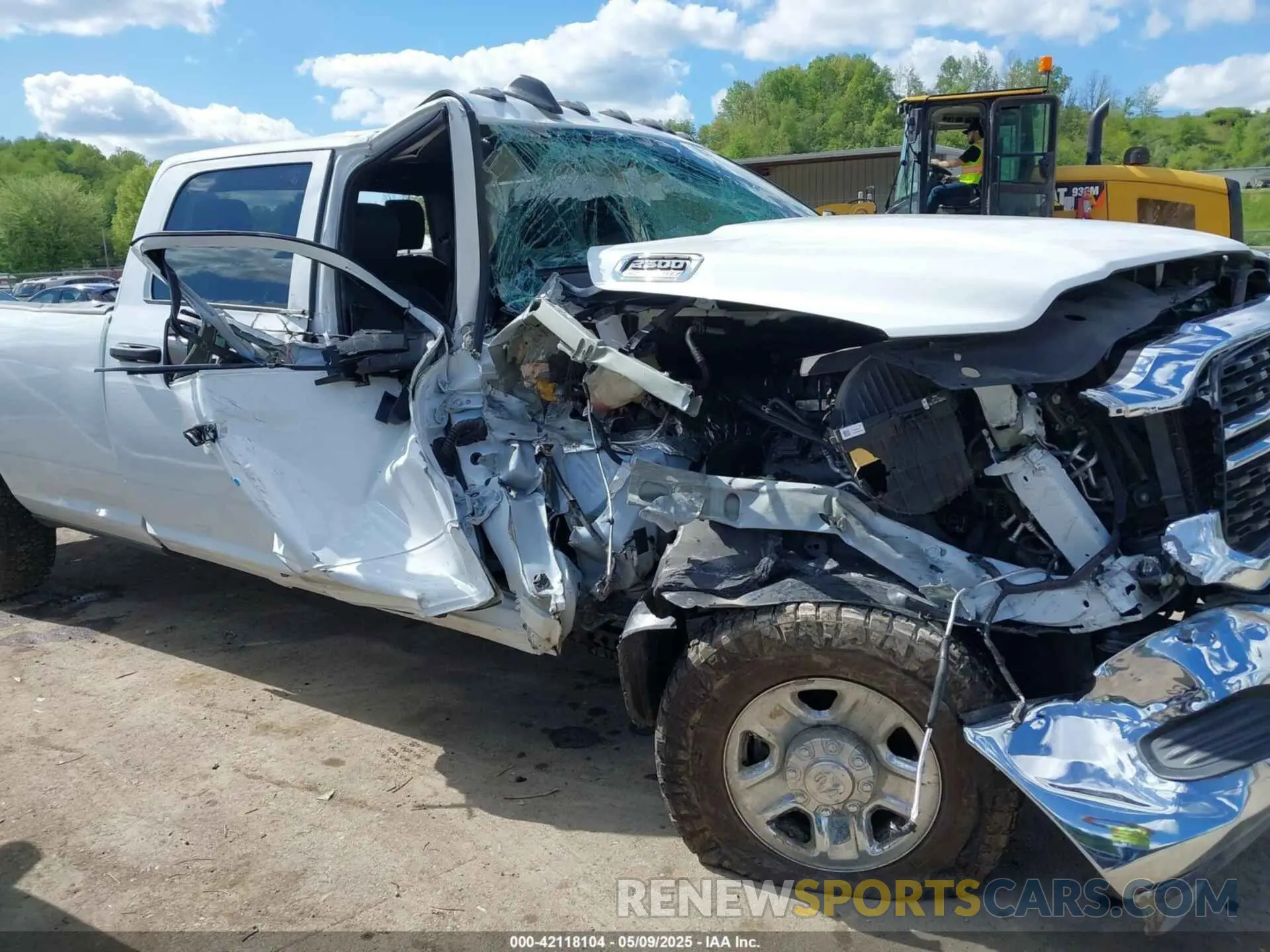 6 Photograph of a damaged car 3C6UR5HJ9PG564714 RAM 2500 2023