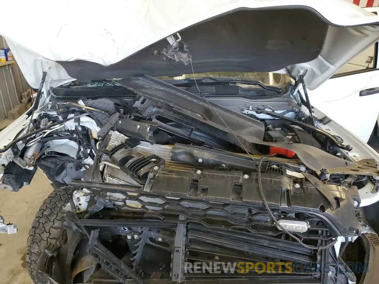 11 Photograph of a damaged car 3C6UR5HJ9PG587488 RAM 2500 2023