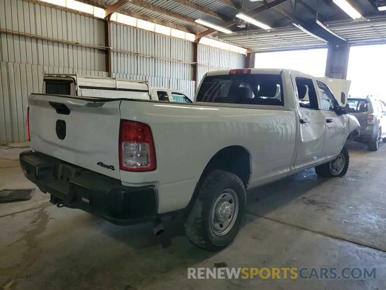 3 Photograph of a damaged car 3C6UR5HJ9PG587488 RAM 2500 2023