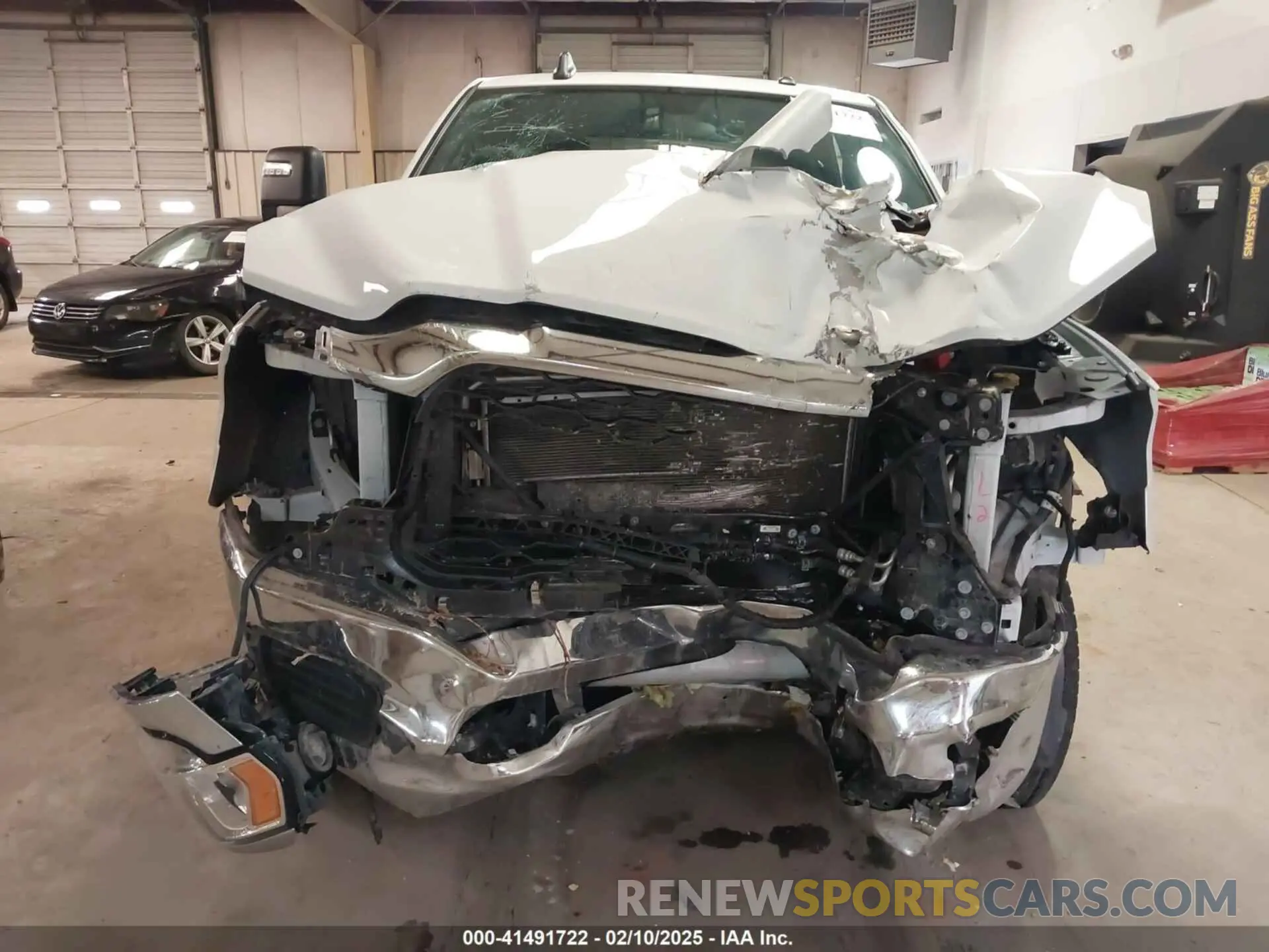 12 Photograph of a damaged car 3C6UR5HL0PG529660 RAM 2500 2023