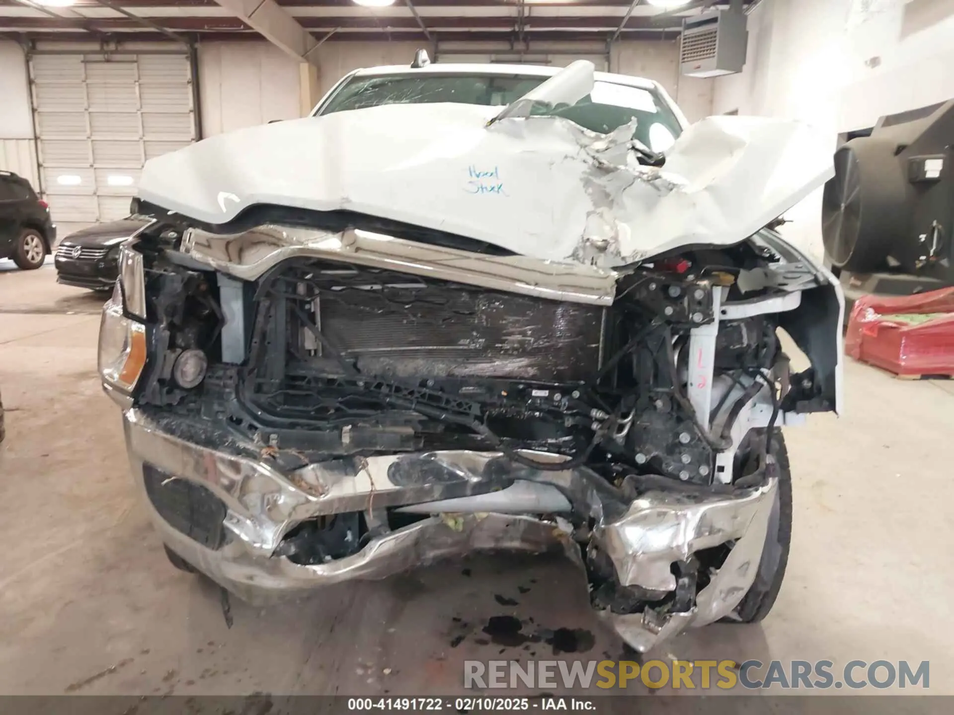 6 Photograph of a damaged car 3C6UR5HL0PG529660 RAM 2500 2023