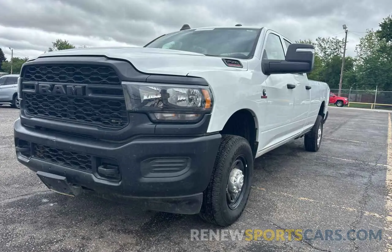 2 Photograph of a damaged car 3C6UR5HL8PG652719 RAM 2500 2023