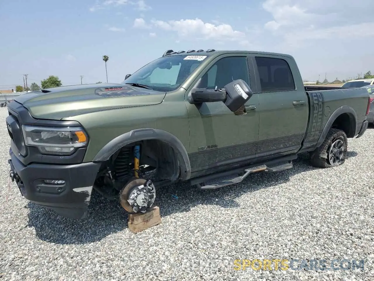 1 Photograph of a damaged car 3C6TR5EJXRG212664 RAM 2500 2024