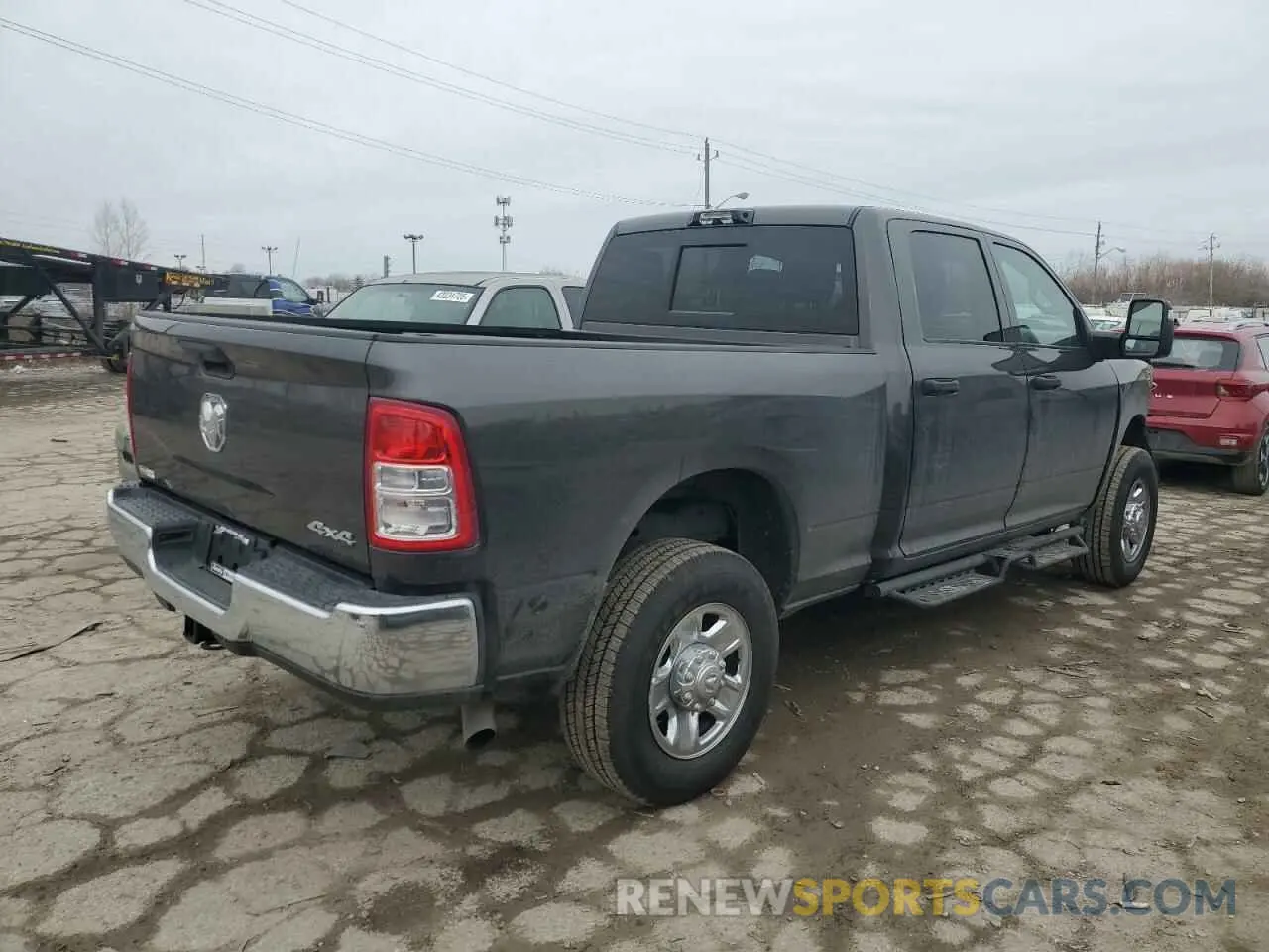 3 Photograph of a damaged car 3C6UR5CJ4RG367640 RAM 2500 2024
