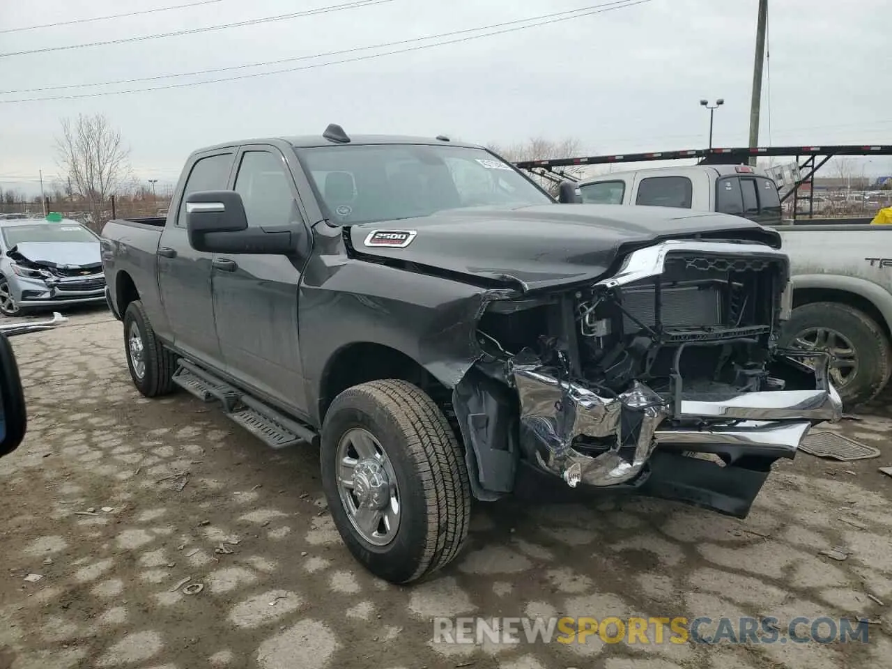 4 Photograph of a damaged car 3C6UR5CJ4RG367640 RAM 2500 2024
