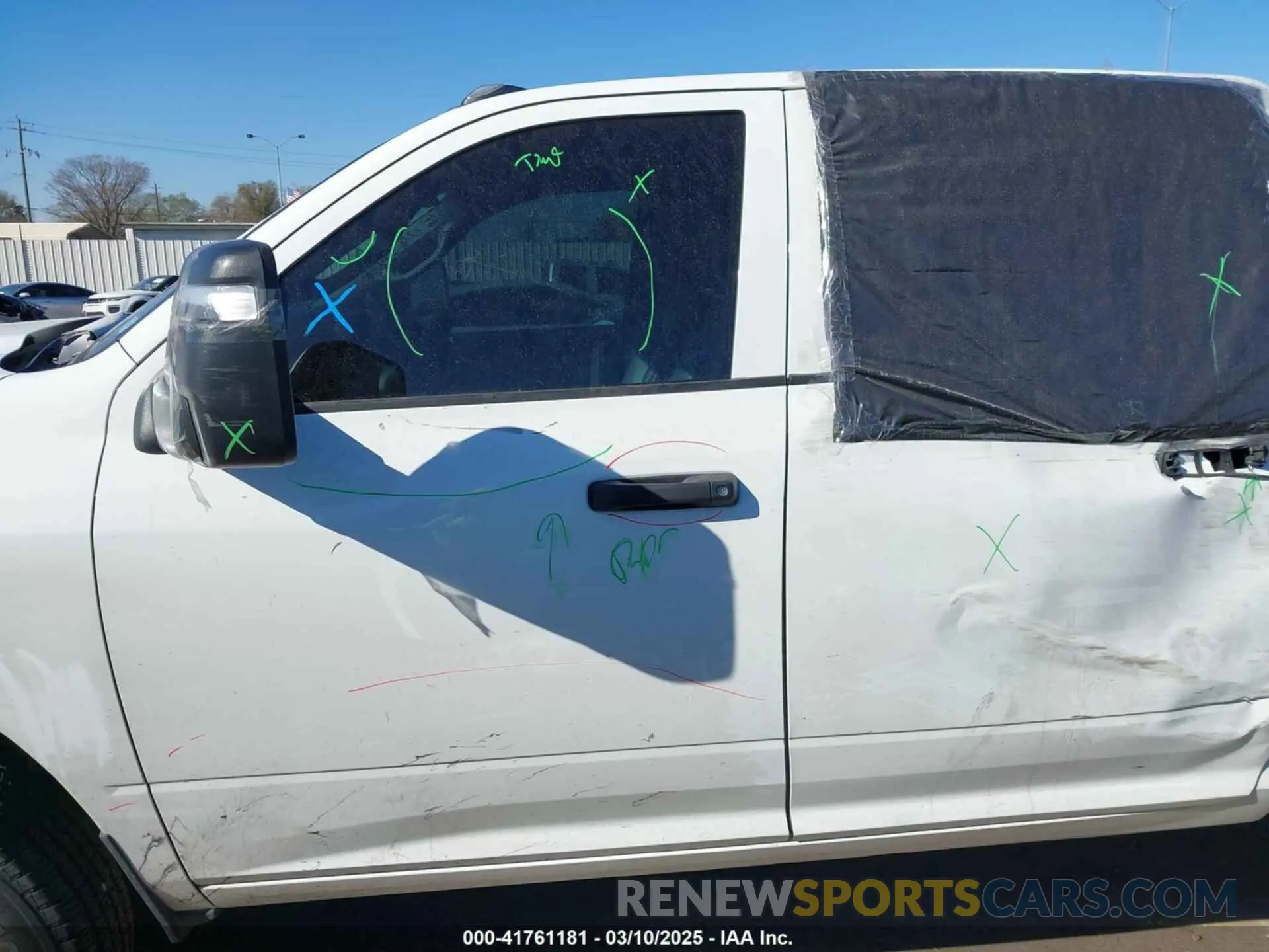 14 Photograph of a damaged car 3C6UR5CJ7RG264311 RAM 2500 2024